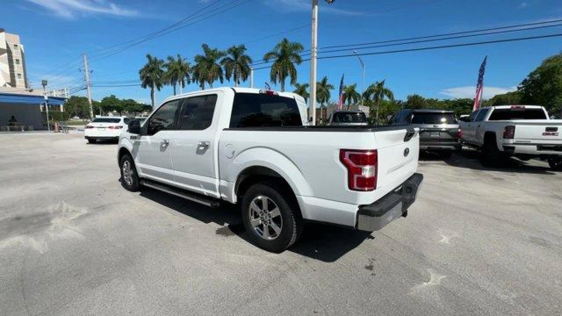 2019 White Ford F-150 (1FTEW1C53KF) with an 8 5.0 L engine, Automatic transmission, located at 27610 S Dixie Hwy, Homestead, FL, 33032, (305) 749-2348, 25.510241, -80.438301 - Delivers 25 Highway MPG and 19 City MPG! This Ford F-150 delivers a Regular Unleaded V8 5.0 L engine powering this Automatic transmission. Variable Intermittent Wipers, Urethane Gear Shifter Material, Transmission w/Driver Selectable Mode and SelectShift Sequential Shift Control.*This Ford F-150 Com - Photo#2