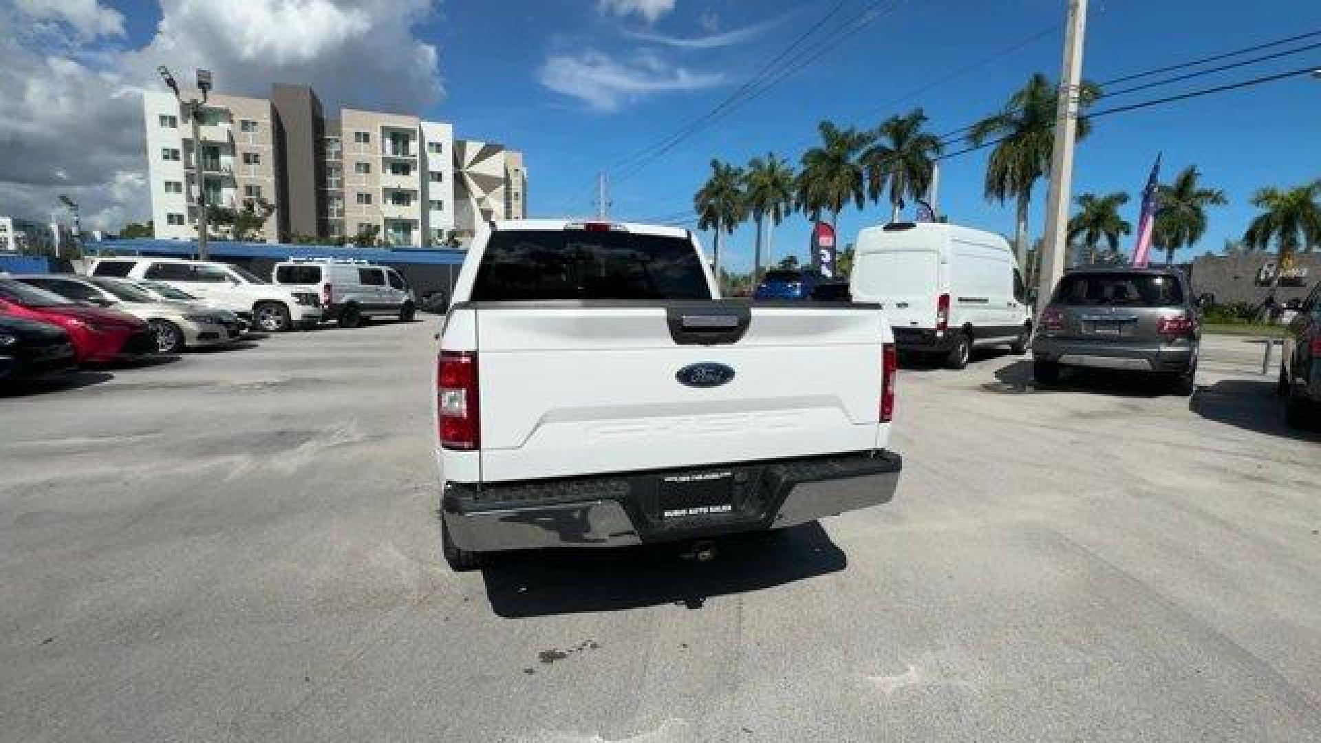 2019 White Ford F-150 (1FTEW1C53KF) with an 8 5.0 L engine, Automatic transmission, located at 27610 S Dixie Hwy, Homestead, FL, 33032, (305) 749-2348, 25.510241, -80.438301 - Delivers 25 Highway MPG and 19 City MPG! This Ford F-150 delivers a Regular Unleaded V8 5.0 L engine powering this Automatic transmission. Variable Intermittent Wipers, Urethane Gear Shifter Material, Transmission w/Driver Selectable Mode and SelectShift Sequential Shift Control.*This Ford F-150 Com - Photo#3