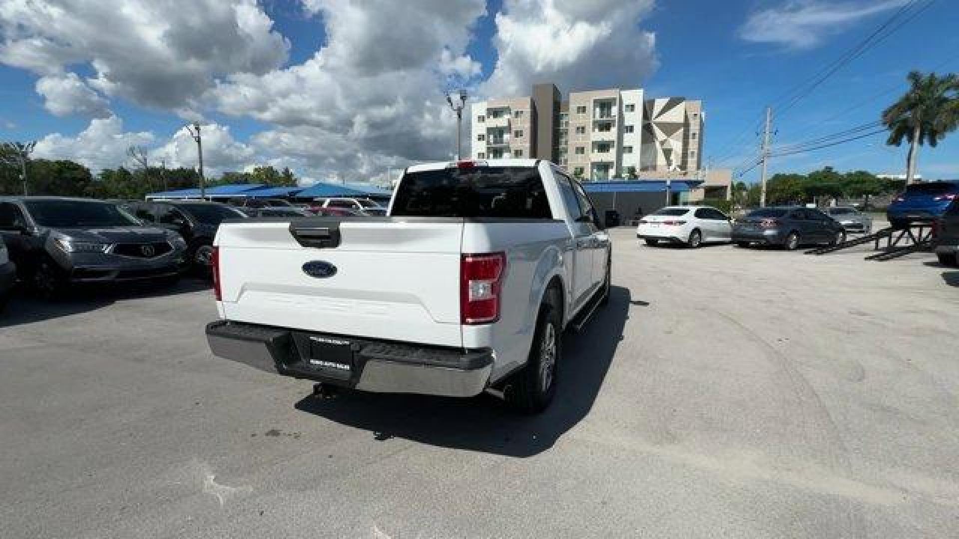 2019 White Ford F-150 (1FTEW1C53KF) with an 8 5.0 L engine, Automatic transmission, located at 27610 S Dixie Hwy, Homestead, FL, 33032, (305) 749-2348, 25.510241, -80.438301 - Delivers 25 Highway MPG and 19 City MPG! This Ford F-150 delivers a Regular Unleaded V8 5.0 L engine powering this Automatic transmission. Variable Intermittent Wipers, Urethane Gear Shifter Material, Transmission w/Driver Selectable Mode and SelectShift Sequential Shift Control.*This Ford F-150 Com - Photo#4