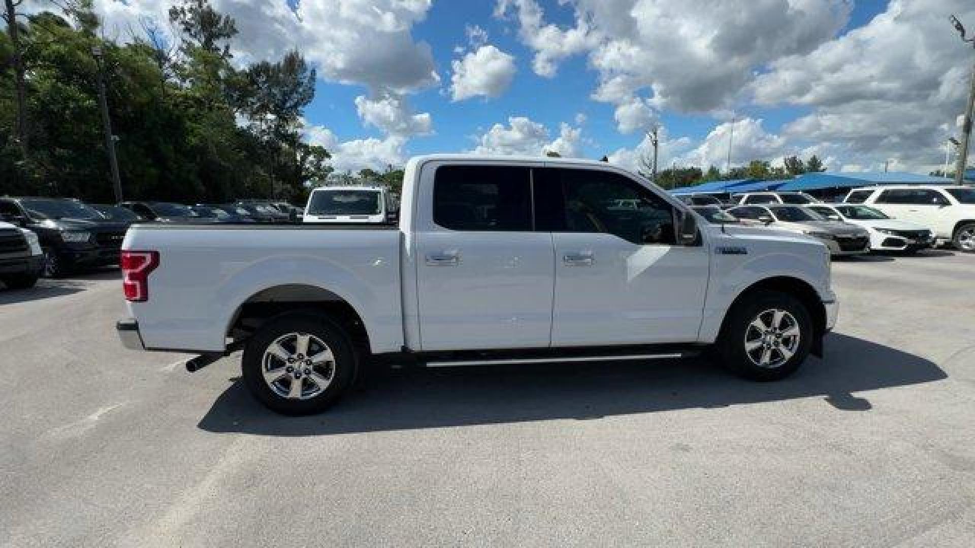 2019 White Ford F-150 (1FTEW1C53KF) with an 8 5.0 L engine, Automatic transmission, located at 27610 S Dixie Hwy, Homestead, FL, 33032, (305) 749-2348, 25.510241, -80.438301 - Delivers 25 Highway MPG and 19 City MPG! This Ford F-150 delivers a Regular Unleaded V8 5.0 L engine powering this Automatic transmission. Variable Intermittent Wipers, Urethane Gear Shifter Material, Transmission w/Driver Selectable Mode and SelectShift Sequential Shift Control.*This Ford F-150 Com - Photo#5