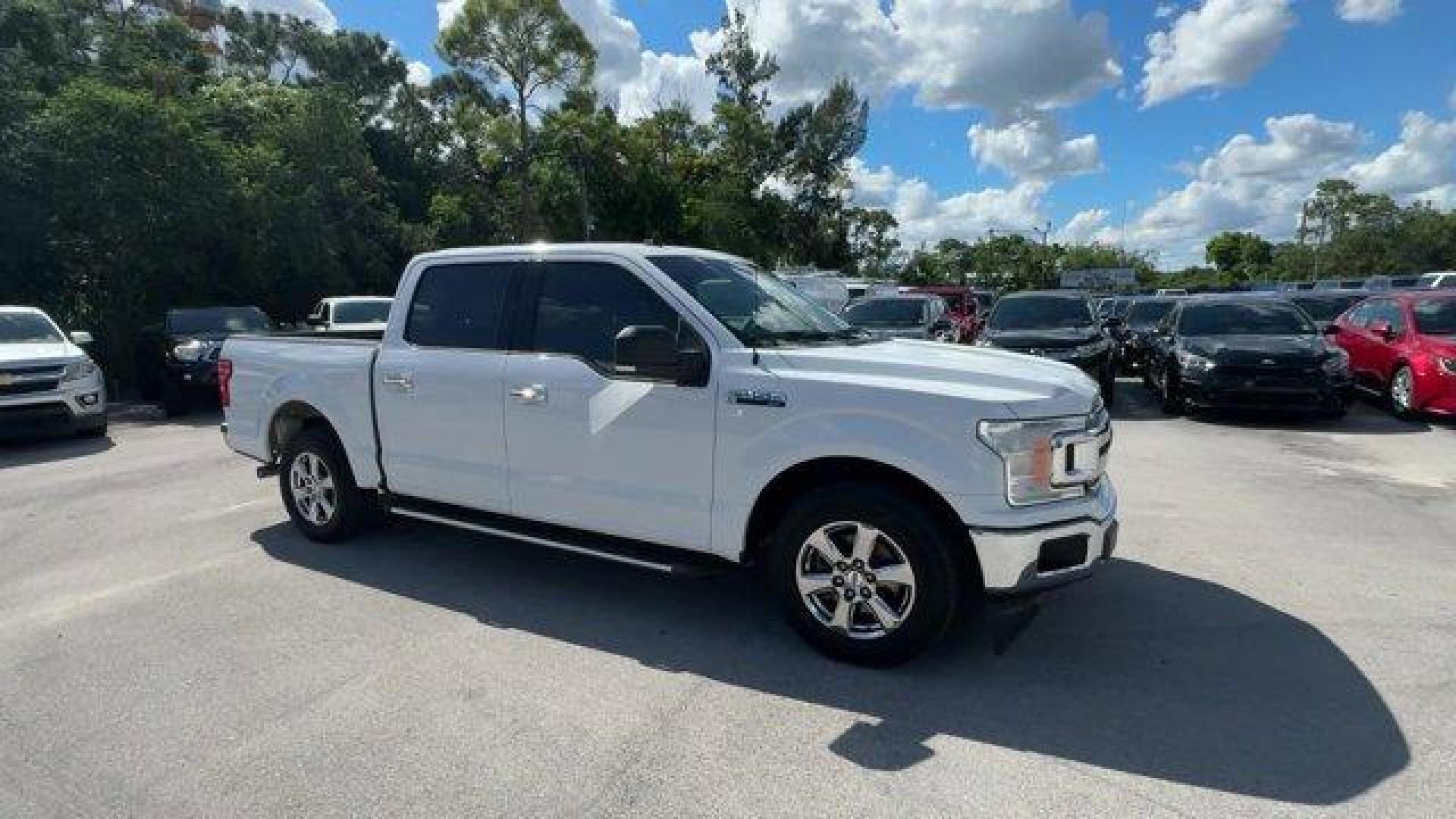 2019 White Ford F-150 (1FTEW1C53KF) with an 8 5.0 L engine, Automatic transmission, located at 27610 S Dixie Hwy, Homestead, FL, 33032, (305) 749-2348, 25.510241, -80.438301 - Delivers 25 Highway MPG and 19 City MPG! This Ford F-150 delivers a Regular Unleaded V8 5.0 L engine powering this Automatic transmission. Variable Intermittent Wipers, Urethane Gear Shifter Material, Transmission w/Driver Selectable Mode and SelectShift Sequential Shift Control.*This Ford F-150 Com - Photo#6