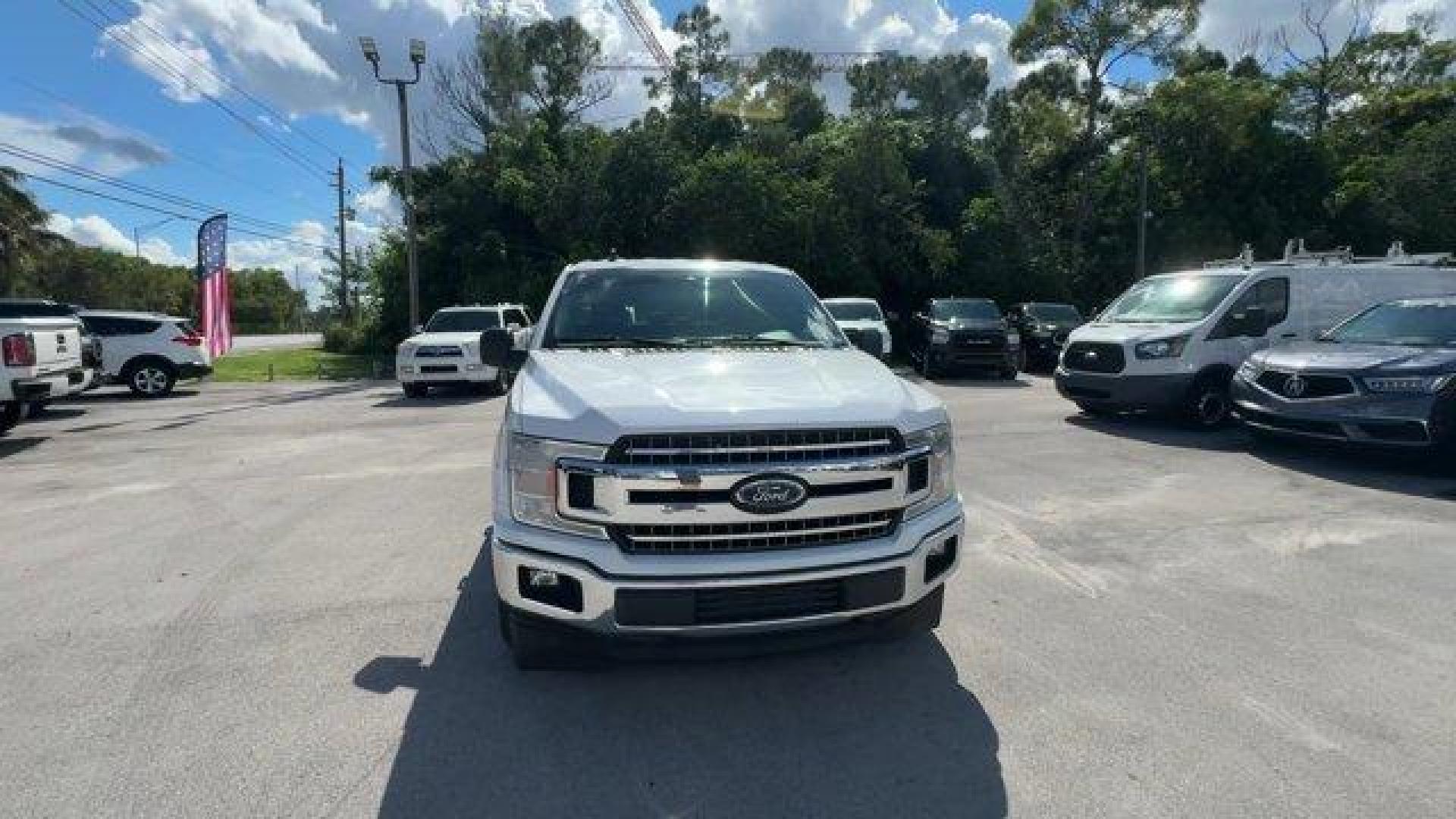 2019 White Ford F-150 (1FTEW1C53KF) with an 8 5.0 L engine, Automatic transmission, located at 27610 S Dixie Hwy, Homestead, FL, 33032, (305) 749-2348, 25.510241, -80.438301 - Delivers 25 Highway MPG and 19 City MPG! This Ford F-150 delivers a Regular Unleaded V8 5.0 L engine powering this Automatic transmission. Variable Intermittent Wipers, Urethane Gear Shifter Material, Transmission w/Driver Selectable Mode and SelectShift Sequential Shift Control.*This Ford F-150 Com - Photo#7