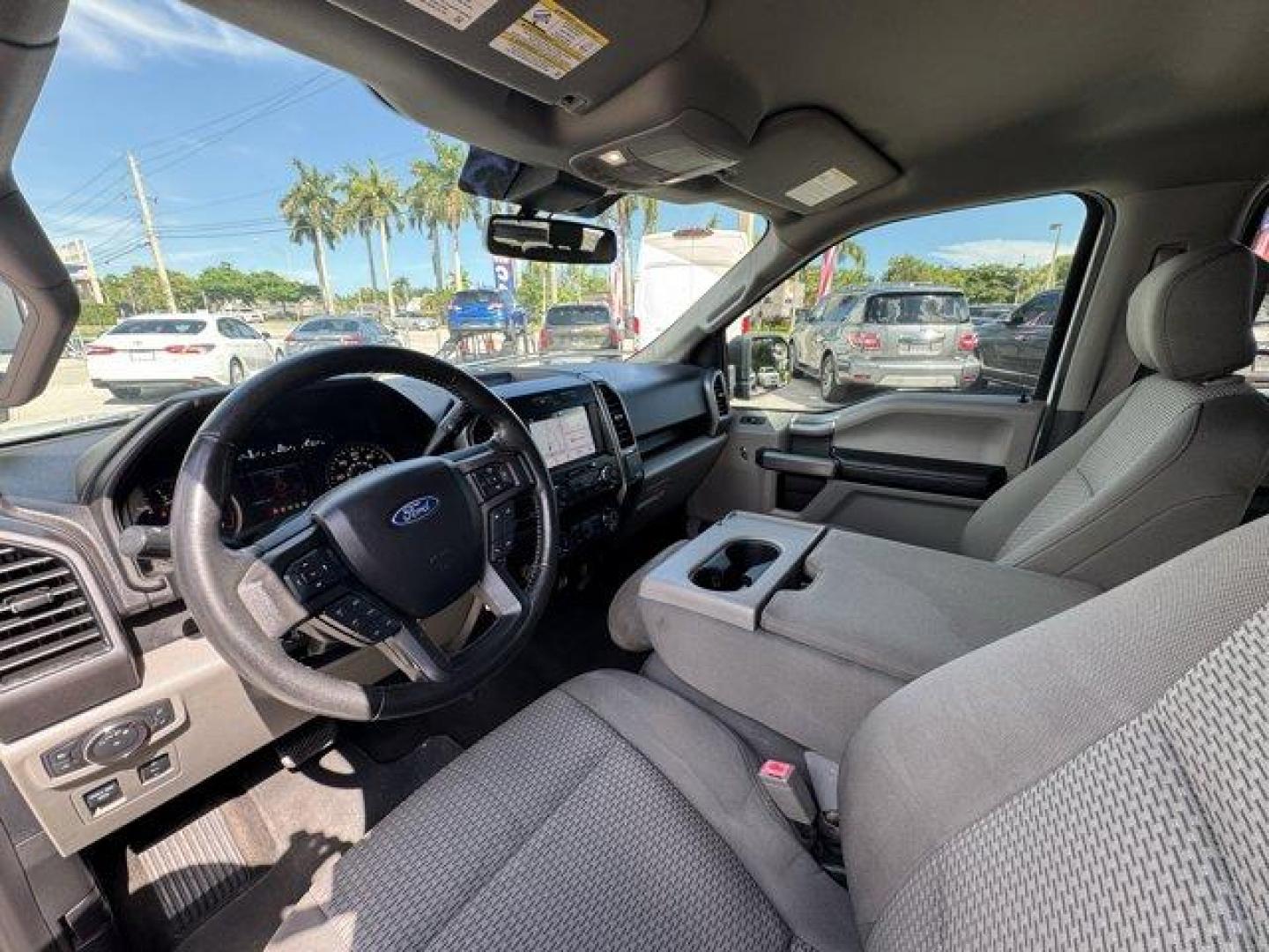 2019 White Ford F-150 (1FTEW1C53KF) with an 8 5.0 L engine, Automatic transmission, located at 27610 S Dixie Hwy, Homestead, FL, 33032, (305) 749-2348, 25.510241, -80.438301 - Delivers 25 Highway MPG and 19 City MPG! This Ford F-150 delivers a Regular Unleaded V8 5.0 L engine powering this Automatic transmission. Variable Intermittent Wipers, Urethane Gear Shifter Material, Transmission w/Driver Selectable Mode and SelectShift Sequential Shift Control.*This Ford F-150 Com - Photo#10