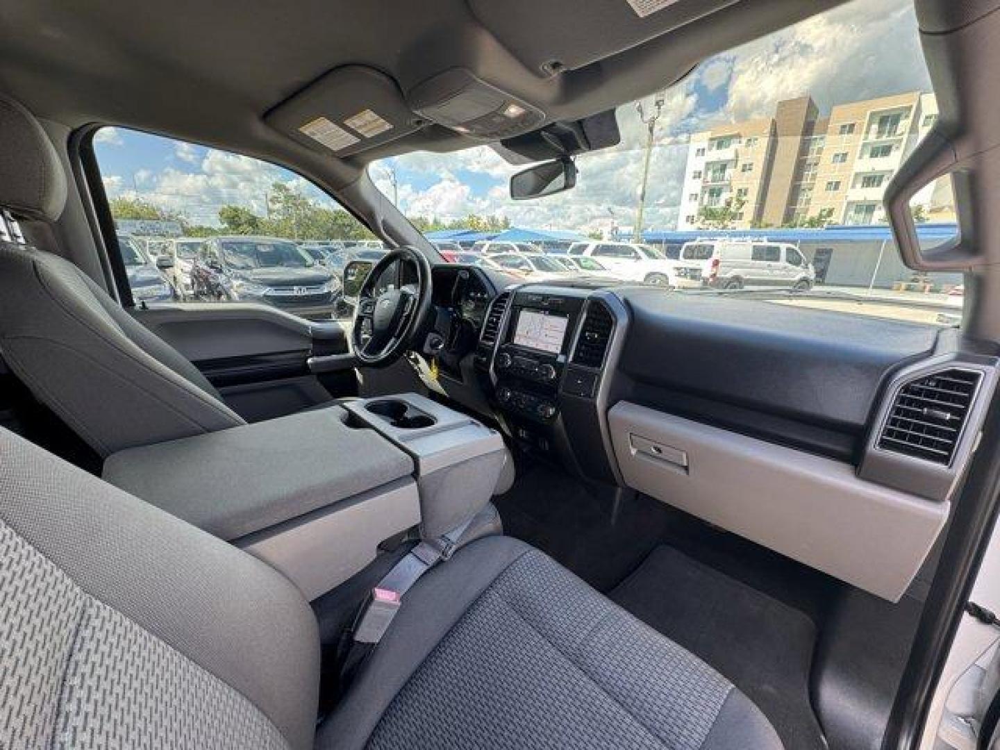 2019 White Ford F-150 (1FTEW1C53KF) with an 8 5.0 L engine, Automatic transmission, located at 27610 S Dixie Hwy, Homestead, FL, 33032, (305) 749-2348, 25.510241, -80.438301 - Delivers 25 Highway MPG and 19 City MPG! This Ford F-150 delivers a Regular Unleaded V8 5.0 L engine powering this Automatic transmission. Variable Intermittent Wipers, Urethane Gear Shifter Material, Transmission w/Driver Selectable Mode and SelectShift Sequential Shift Control.*This Ford F-150 Com - Photo#11