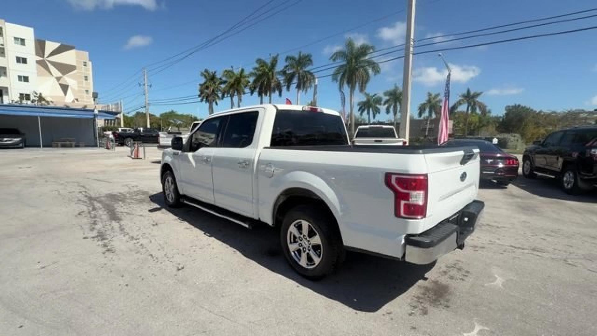 2019 White Ford F-150 (1FTEW1C53KF) with an 8 5.0 L engine, Automatic transmission, located at 27610 S Dixie Hwy, Homestead, FL, 33032, (305) 749-2348, 25.510241, -80.438301 - Delivers 25 Highway MPG and 19 City MPG! This Ford F-150 delivers a Regular Unleaded V8 5.0 L engine powering this Automatic transmission. Variable Intermittent Wipers, Urethane Gear Shifter Material, Transmission w/Driver Selectable Mode and SelectShift Sequential Shift Control.*This Ford F-150 Com- Photo#2