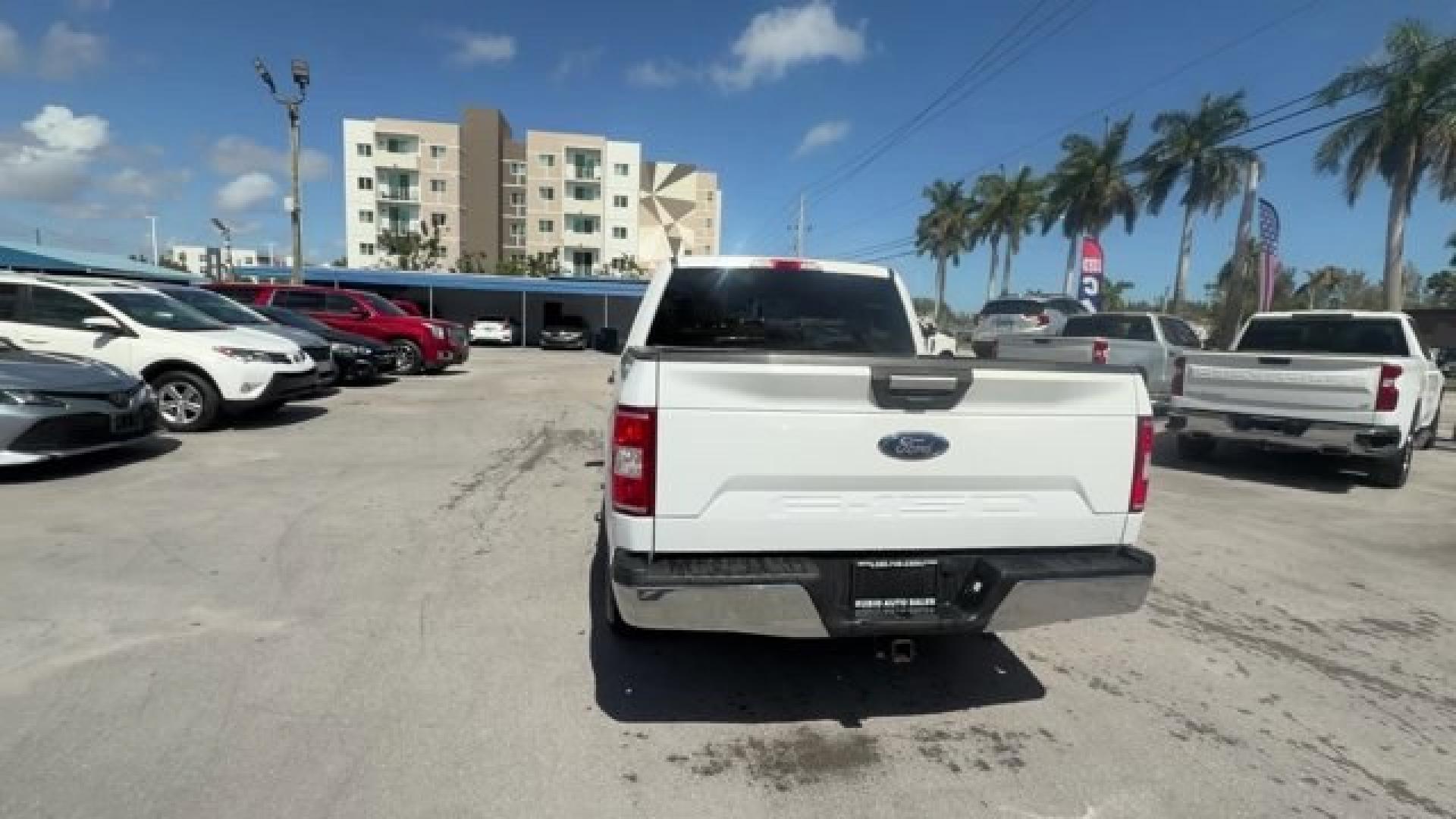 2019 White Ford F-150 (1FTEW1C53KF) with an 8 5.0 L engine, Automatic transmission, located at 27610 S Dixie Hwy, Homestead, FL, 33032, (305) 749-2348, 25.510241, -80.438301 - Delivers 25 Highway MPG and 19 City MPG! This Ford F-150 delivers a Regular Unleaded V8 5.0 L engine powering this Automatic transmission. Variable Intermittent Wipers, Urethane Gear Shifter Material, Transmission w/Driver Selectable Mode and SelectShift Sequential Shift Control.*This Ford F-150 Com- Photo#3