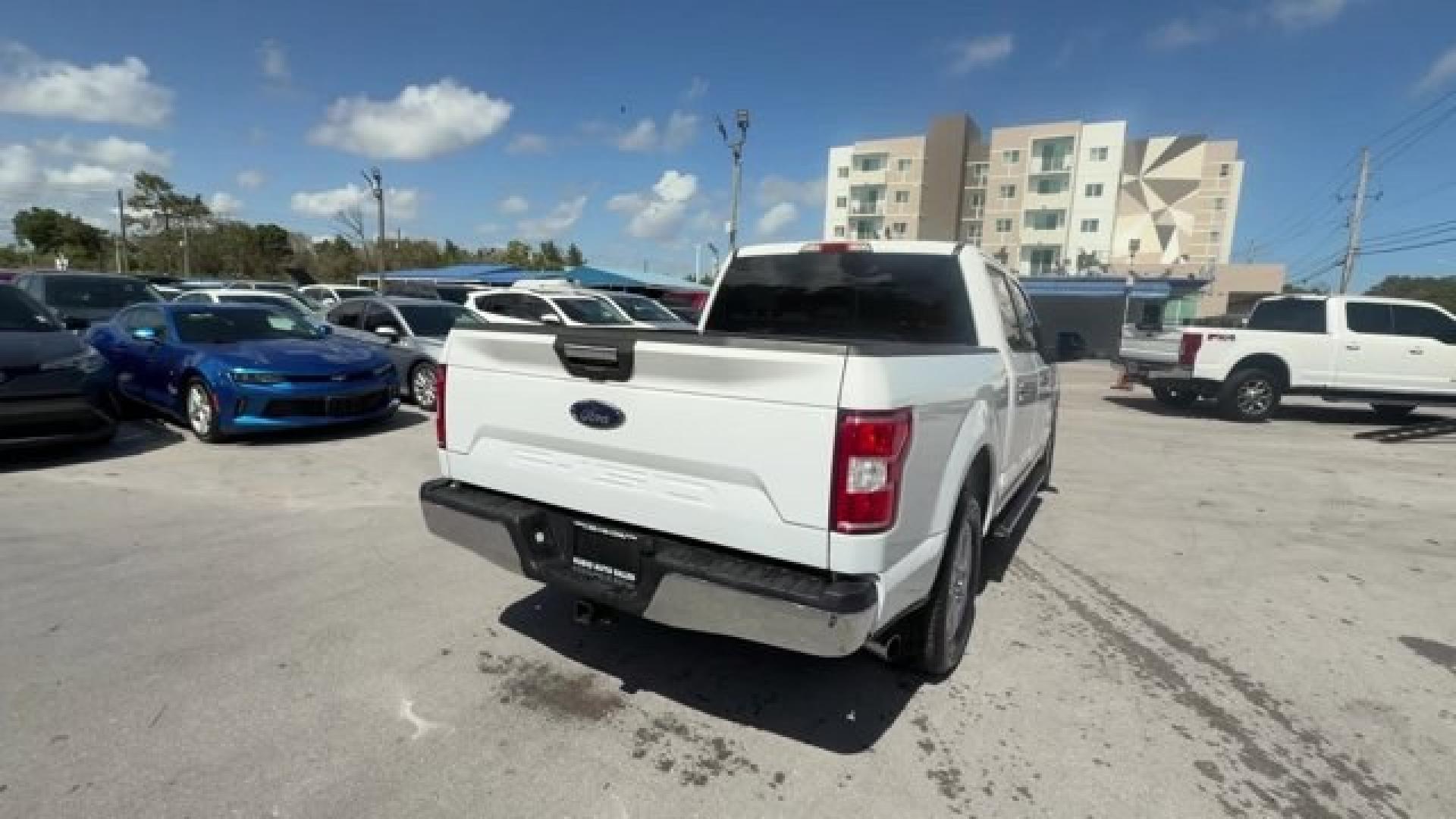 2019 White Ford F-150 (1FTEW1C53KF) with an 8 5.0 L engine, Automatic transmission, located at 27610 S Dixie Hwy, Homestead, FL, 33032, (305) 749-2348, 25.510241, -80.438301 - Delivers 25 Highway MPG and 19 City MPG! This Ford F-150 delivers a Regular Unleaded V8 5.0 L engine powering this Automatic transmission. Variable Intermittent Wipers, Urethane Gear Shifter Material, Transmission w/Driver Selectable Mode and SelectShift Sequential Shift Control.*This Ford F-150 Com- Photo#4