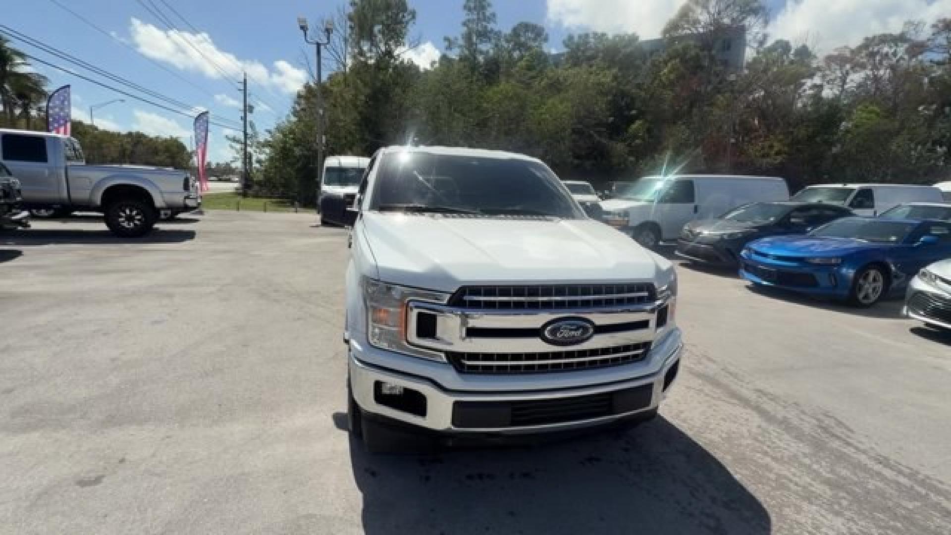 2019 White Ford F-150 (1FTEW1C53KF) with an 8 5.0 L engine, Automatic transmission, located at 27610 S Dixie Hwy, Homestead, FL, 33032, (305) 749-2348, 25.510241, -80.438301 - Delivers 25 Highway MPG and 19 City MPG! This Ford F-150 delivers a Regular Unleaded V8 5.0 L engine powering this Automatic transmission. Variable Intermittent Wipers, Urethane Gear Shifter Material, Transmission w/Driver Selectable Mode and SelectShift Sequential Shift Control.*This Ford F-150 Com- Photo#7