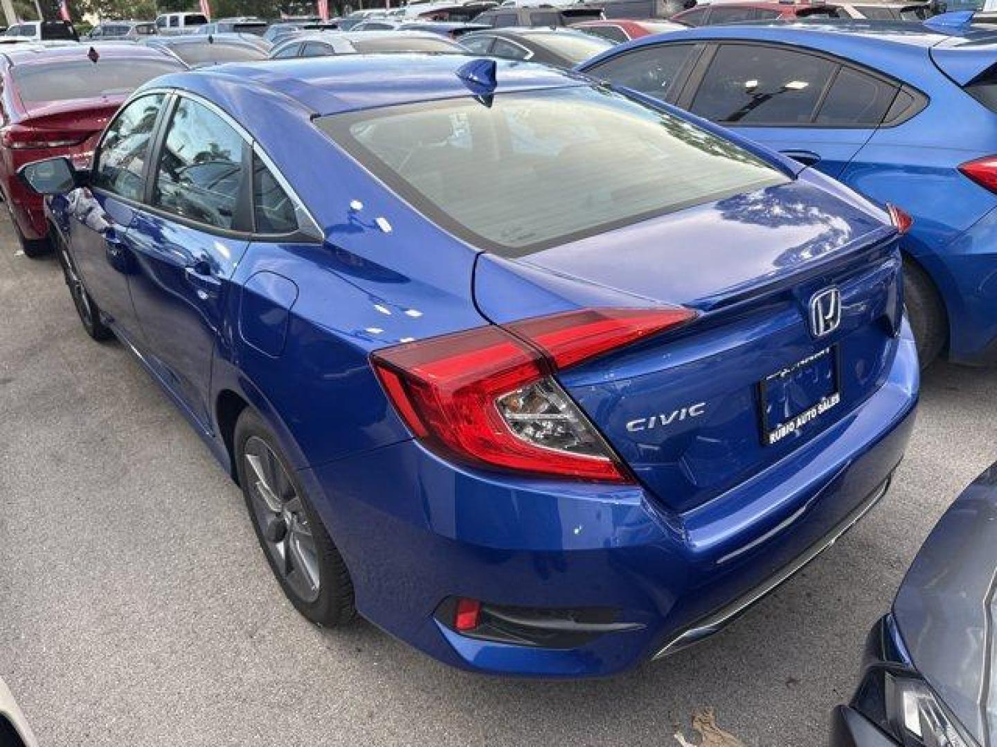 2021 Blue Honda Civic Sedan (19XFC1F7XME) with an 4 1.5 L engine, Variable transmission, located at 27610 S Dixie Hwy, Homestead, FL, 33032, (305) 749-2348, 25.510241, -80.438301 - Boasts 42 Highway MPG and 32 City MPG! This Honda Civic Sedan boasts a Intercooled Turbo Regular Unleaded I-4 1.5 L/91 engine powering this Variable transmission. Wheels: 17 Alloy, Wheels w/Silver Accents, Vehicle Stability Assist (VSA) Electronic Stability Control (ESC).* This Honda Civic Sedan Fea - Photo#1