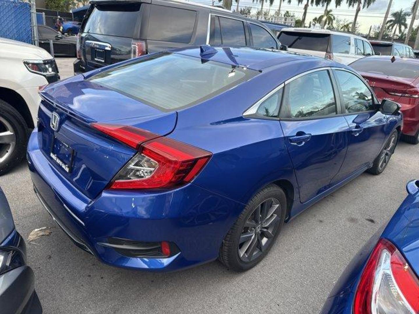 2021 Blue Honda Civic Sedan (19XFC1F7XME) with an 4 1.5 L engine, Variable transmission, located at 27610 S Dixie Hwy, Homestead, FL, 33032, (305) 749-2348, 25.510241, -80.438301 - Boasts 42 Highway MPG and 32 City MPG! This Honda Civic Sedan boasts a Intercooled Turbo Regular Unleaded I-4 1.5 L/91 engine powering this Variable transmission. Wheels: 17 Alloy, Wheels w/Silver Accents, Vehicle Stability Assist (VSA) Electronic Stability Control (ESC).* This Honda Civic Sedan Fea - Photo#2