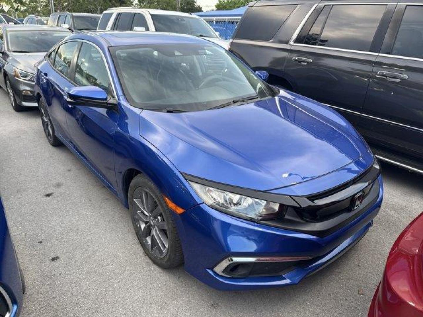 2021 Blue Honda Civic Sedan (19XFC1F7XME) with an 4 1.5 L engine, Variable transmission, located at 27610 S Dixie Hwy, Homestead, FL, 33032, (305) 749-2348, 25.510241, -80.438301 - Boasts 42 Highway MPG and 32 City MPG! This Honda Civic Sedan boasts a Intercooled Turbo Regular Unleaded I-4 1.5 L/91 engine powering this Variable transmission. Wheels: 17 Alloy, Wheels w/Silver Accents, Vehicle Stability Assist (VSA) Electronic Stability Control (ESC).* This Honda Civic Sedan Fea - Photo#3