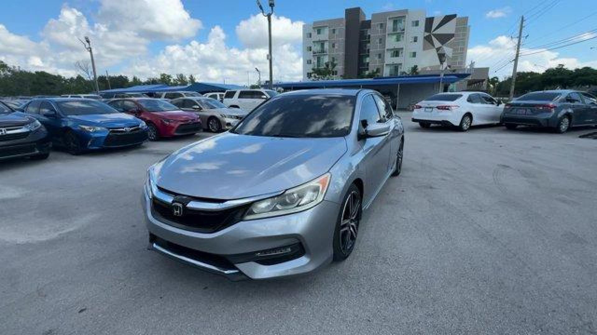 2016 Silver Honda Accord Sedan (1HGCR2F63GA) with an 4 2.4 L engine, Variable transmission, located at 27610 S Dixie Hwy, Homestead, FL, 33032, (305) 749-2348, 25.510241, -80.438301 - KBB.com Brand Image Awards. Boasts 35 Highway MPG and 26 City MPG! This Honda Accord Sedan boasts a Regular Unleaded I-4 2.4 L/144 engine powering this Variable transmission. Window Grid Antenna, Wheels: 19 Alloy, VSA Electronic Stability Control (ESC).* This Honda Accord Sedan Features the Followin - Photo#0