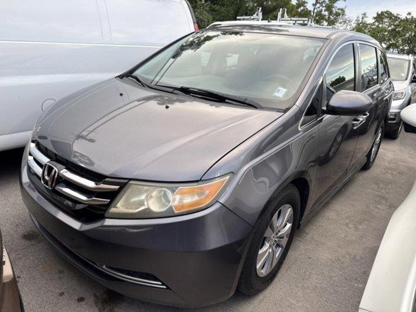 2016 Gray Honda Odyssey (5FNRL5H31GB) with an 6 3.5 L engine, Automatic transmission, located at 27610 S Dixie Hwy, Homestead, FL, 33032, (305) 749-2348, 25.510241, -80.438301 - IIHS Top Safety Pick. Scores 28 Highway MPG and 19 City MPG! This Honda Odyssey delivers a Regular Unleaded V-6 3.5 L/212 engine powering this Automatic transmission. Window Grid Antenna, Wheels: 17 x 7 Alloy, VSA Electronic Stability Control (ESC).* This Honda Odyssey Features the Following Options - Photo#0