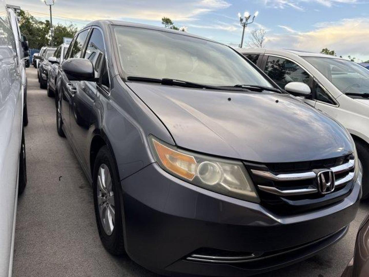 2016 Gray Honda Odyssey (5FNRL5H31GB) with an 6 3.5 L engine, Automatic transmission, located at 27610 S Dixie Hwy, Homestead, FL, 33032, (305) 749-2348, 25.510241, -80.438301 - IIHS Top Safety Pick. Scores 28 Highway MPG and 19 City MPG! This Honda Odyssey delivers a Regular Unleaded V-6 3.5 L/212 engine powering this Automatic transmission. Window Grid Antenna, Wheels: 17 x 7 Alloy, VSA Electronic Stability Control (ESC).* This Honda Odyssey Features the Following Options - Photo#3