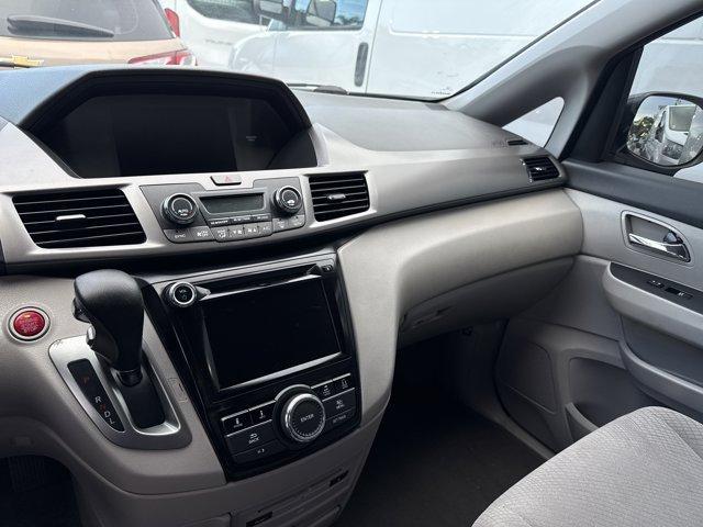 2016 Gray Honda Odyssey (5FNRL5H31GB) with an 6 3.5 L engine, Automatic transmission, located at 27610 S Dixie Hwy, Homestead, FL, 33032, (305) 749-2348, 25.510241, -80.438301 - IIHS Top Safety Pick. Scores 28 Highway MPG and 19 City MPG! This Honda Odyssey delivers a Regular Unleaded V-6 3.5 L/212 engine powering this Automatic transmission. Window Grid Antenna, Wheels: 17 x 7 Alloy, VSA Electronic Stability Control (ESC).* This Honda Odyssey Features the Following Options - Photo#4