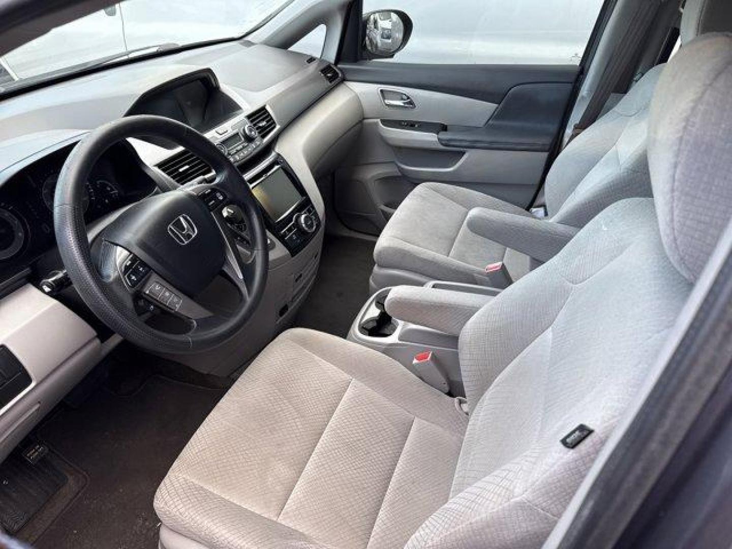 2016 Gray Honda Odyssey (5FNRL5H31GB) with an 6 3.5 L engine, Automatic transmission, located at 27610 S Dixie Hwy, Homestead, FL, 33032, (305) 749-2348, 25.510241, -80.438301 - IIHS Top Safety Pick. Scores 28 Highway MPG and 19 City MPG! This Honda Odyssey delivers a Regular Unleaded V-6 3.5 L/212 engine powering this Automatic transmission. Window Grid Antenna, Wheels: 17 x 7 Alloy, VSA Electronic Stability Control (ESC).* This Honda Odyssey Features the Following Options - Photo#5