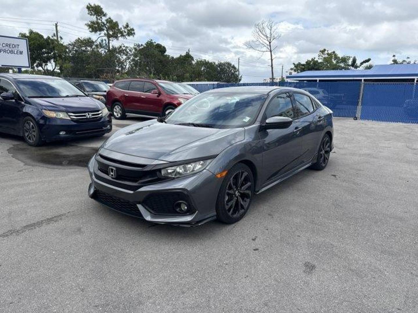 2017 Gray Honda Civic Hatchback (SHHFK7H40HU) with an 4 1.5 L engine, Variable transmission, located at 27610 S Dixie Hwy, Homestead, FL, 33032, (305) 749-2348, 25.510241, -80.438301 - KBB.com Brand Image Awards. Delivers 36 Highway MPG and 30 City MPG! This Honda Civic Hatchback boasts a Intercooled Turbo Premium Unleaded I-4 1.5 L/91 engine powering this Variable transmission. Wheels: 18 Alloy, Wheels w/Machined w/Painted Accents Accents, VSA Electronic Stability Control (ESC).* - Photo#0