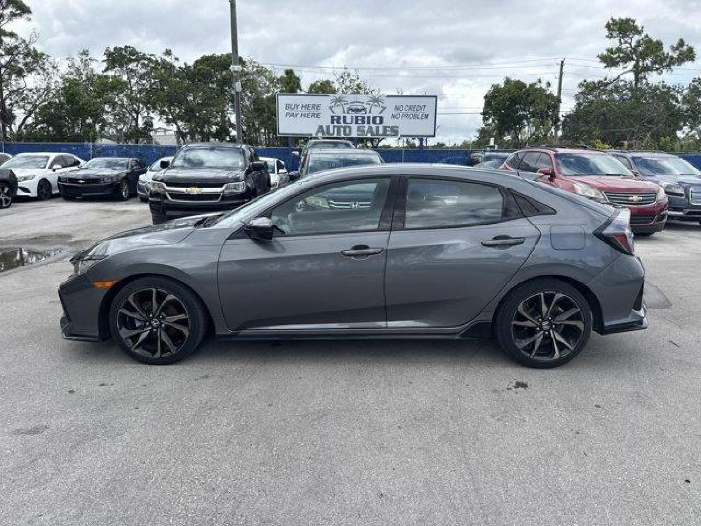 2017 Gray Honda Civic Hatchback (SHHFK7H40HU) with an 4 1.5 L engine, Variable transmission, located at 27610 S Dixie Hwy, Homestead, FL, 33032, (305) 749-2348, 25.510241, -80.438301 - KBB.com Brand Image Awards. Delivers 36 Highway MPG and 30 City MPG! This Honda Civic Hatchback boasts a Intercooled Turbo Premium Unleaded I-4 1.5 L/91 engine powering this Variable transmission. Wheels: 18 Alloy, Wheels w/Machined w/Painted Accents Accents, VSA Electronic Stability Control (ESC).* - Photo#1