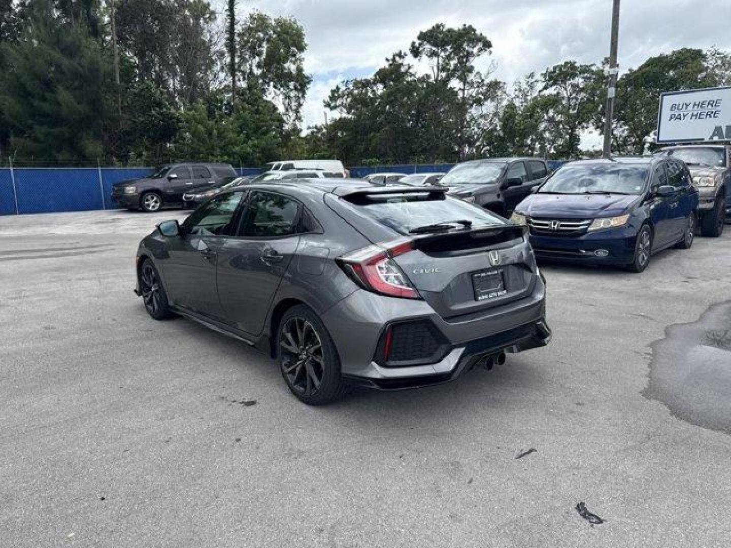 2017 Gray Honda Civic Hatchback (SHHFK7H40HU) with an 4 1.5 L engine, Variable transmission, located at 27610 S Dixie Hwy, Homestead, FL, 33032, (305) 749-2348, 25.510241, -80.438301 - KBB.com Brand Image Awards. Delivers 36 Highway MPG and 30 City MPG! This Honda Civic Hatchback boasts a Intercooled Turbo Premium Unleaded I-4 1.5 L/91 engine powering this Variable transmission. Wheels: 18 Alloy, Wheels w/Machined w/Painted Accents Accents, VSA Electronic Stability Control (ESC).* - Photo#2