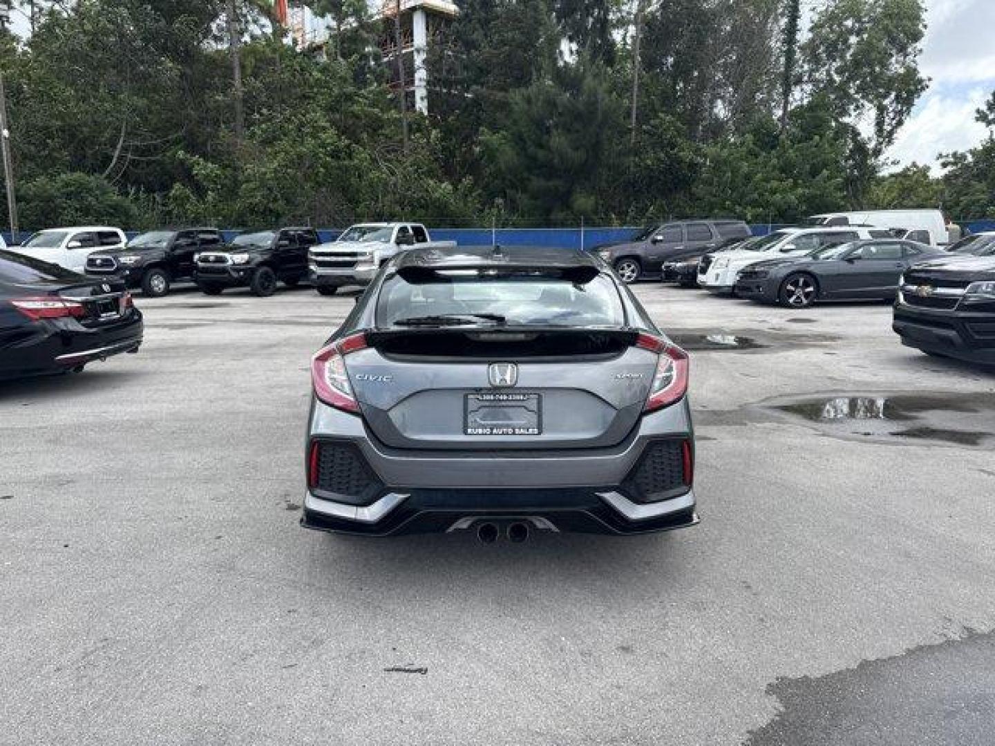 2017 Gray Honda Civic Hatchback (SHHFK7H40HU) with an 4 1.5 L engine, Variable transmission, located at 27610 S Dixie Hwy, Homestead, FL, 33032, (305) 749-2348, 25.510241, -80.438301 - KBB.com Brand Image Awards. Delivers 36 Highway MPG and 30 City MPG! This Honda Civic Hatchback boasts a Intercooled Turbo Premium Unleaded I-4 1.5 L/91 engine powering this Variable transmission. Wheels: 18 Alloy, Wheels w/Machined w/Painted Accents Accents, VSA Electronic Stability Control (ESC).* - Photo#3