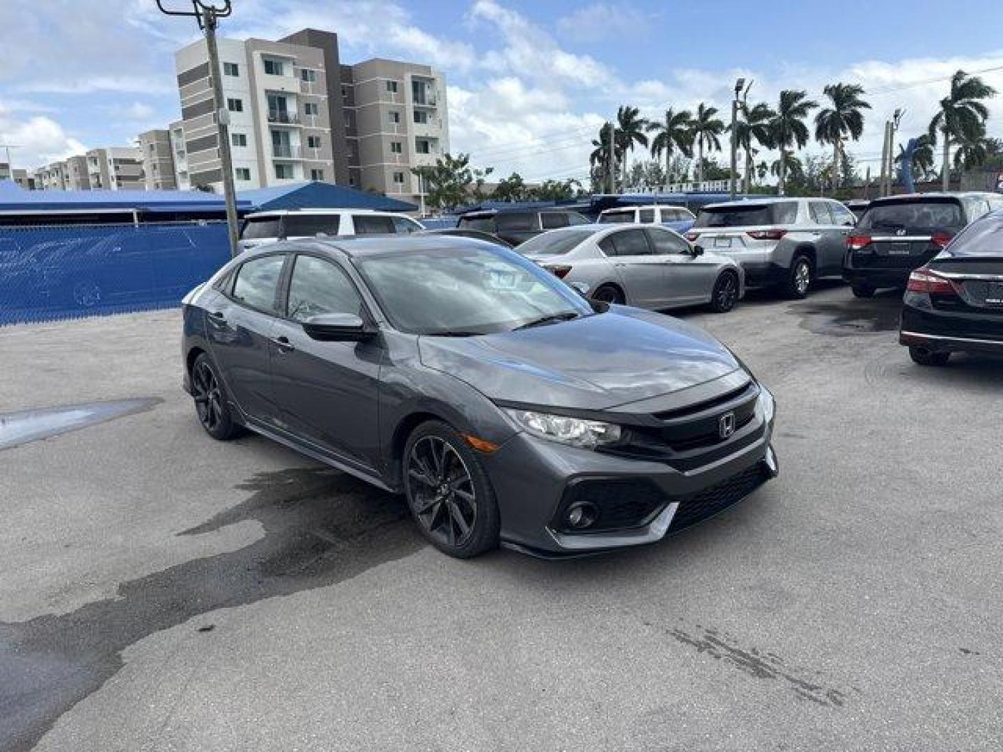 2017 Gray Honda Civic Hatchback (SHHFK7H40HU) with an 4 1.5 L engine, Variable transmission, located at 27610 S Dixie Hwy, Homestead, FL, 33032, (305) 749-2348, 25.510241, -80.438301 - KBB.com Brand Image Awards. Delivers 36 Highway MPG and 30 City MPG! This Honda Civic Hatchback boasts a Intercooled Turbo Premium Unleaded I-4 1.5 L/91 engine powering this Variable transmission. Wheels: 18 Alloy, Wheels w/Machined w/Painted Accents Accents, VSA Electronic Stability Control (ESC).* - Photo#6
