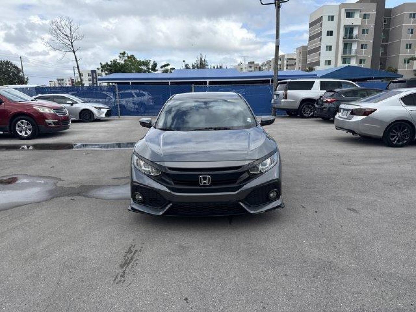 2017 Gray Honda Civic Hatchback (SHHFK7H40HU) with an 4 1.5 L engine, Variable transmission, located at 27610 S Dixie Hwy, Homestead, FL, 33032, (305) 749-2348, 25.510241, -80.438301 - KBB.com Brand Image Awards. Delivers 36 Highway MPG and 30 City MPG! This Honda Civic Hatchback boasts a Intercooled Turbo Premium Unleaded I-4 1.5 L/91 engine powering this Variable transmission. Wheels: 18 Alloy, Wheels w/Machined w/Painted Accents Accents, VSA Electronic Stability Control (ESC).* - Photo#7
