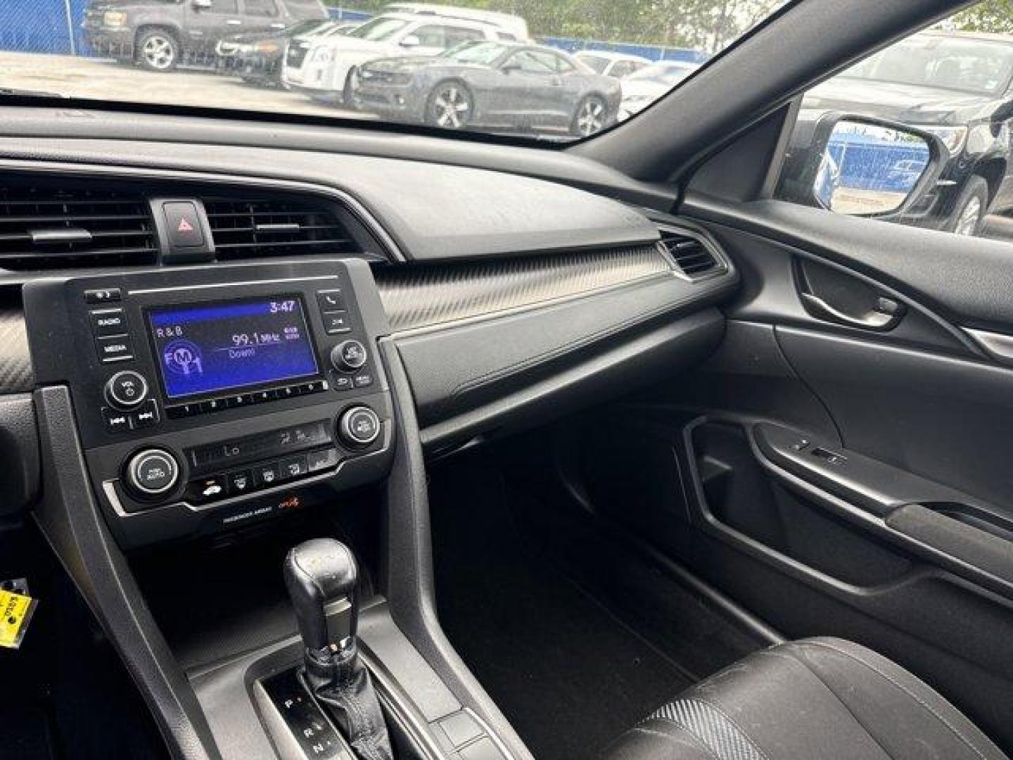 2017 Gray Honda Civic Hatchback (SHHFK7H40HU) with an 4 1.5 L engine, Variable transmission, located at 27610 S Dixie Hwy, Homestead, FL, 33032, (305) 749-2348, 25.510241, -80.438301 - KBB.com Brand Image Awards. Delivers 36 Highway MPG and 30 City MPG! This Honda Civic Hatchback boasts a Intercooled Turbo Premium Unleaded I-4 1.5 L/91 engine powering this Variable transmission. Wheels: 18 Alloy, Wheels w/Machined w/Painted Accents Accents, VSA Electronic Stability Control (ESC).* - Photo#9