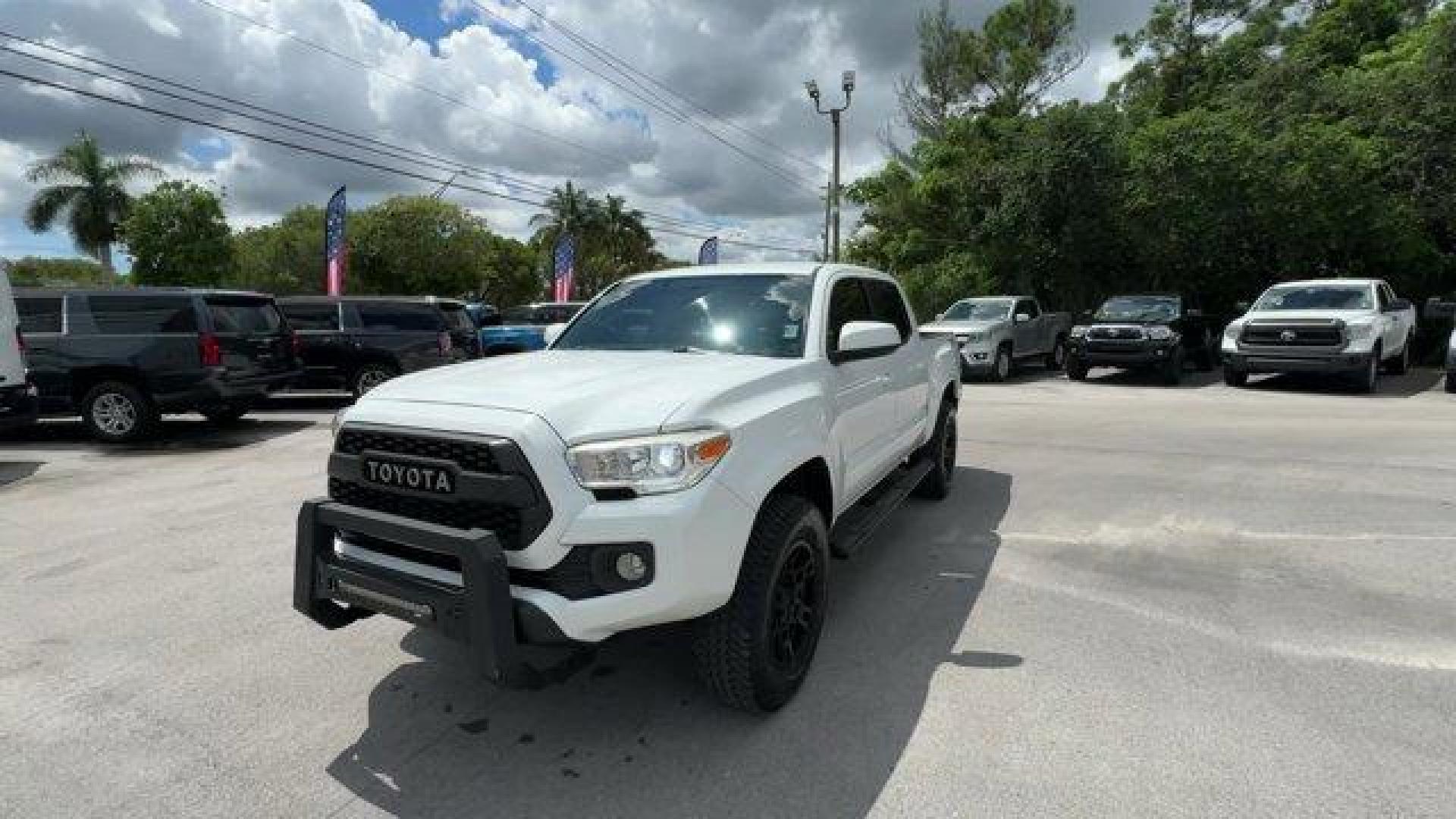 2016 White Toyota Tacoma (5TFAX5GN4GX) with an 4 2.7 L engine, Automatic transmission, located at 27610 S Dixie Hwy, Homestead, FL, 33032, (305) 749-2348, 25.510241, -80.438301 - KBB.com Best Resale Value Awards. Delivers 23 Highway MPG and 19 City MPG! This Toyota Tacoma boasts a Regular Unleaded I-4 2.7 L/164 engine powering this Automatic transmission. Wheels: 16 x 7J+30 Style Steel Disc, Urethane Gear Shifter Material, Transmission: 6-Speed Automatic -inc: electronic shi - Photo#0