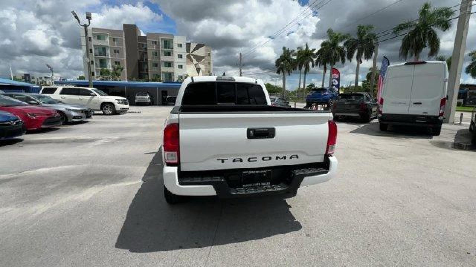 2016 White Toyota Tacoma (5TFAX5GN4GX) with an 4 2.7 L engine, Automatic transmission, located at 27610 S Dixie Hwy, Homestead, FL, 33032, (305) 749-2348, 25.510241, -80.438301 - KBB.com Best Resale Value Awards. Delivers 23 Highway MPG and 19 City MPG! This Toyota Tacoma boasts a Regular Unleaded I-4 2.7 L/164 engine powering this Automatic transmission. Wheels: 16 x 7J+30 Style Steel Disc, Urethane Gear Shifter Material, Transmission: 6-Speed Automatic -inc: electronic shi - Photo#3