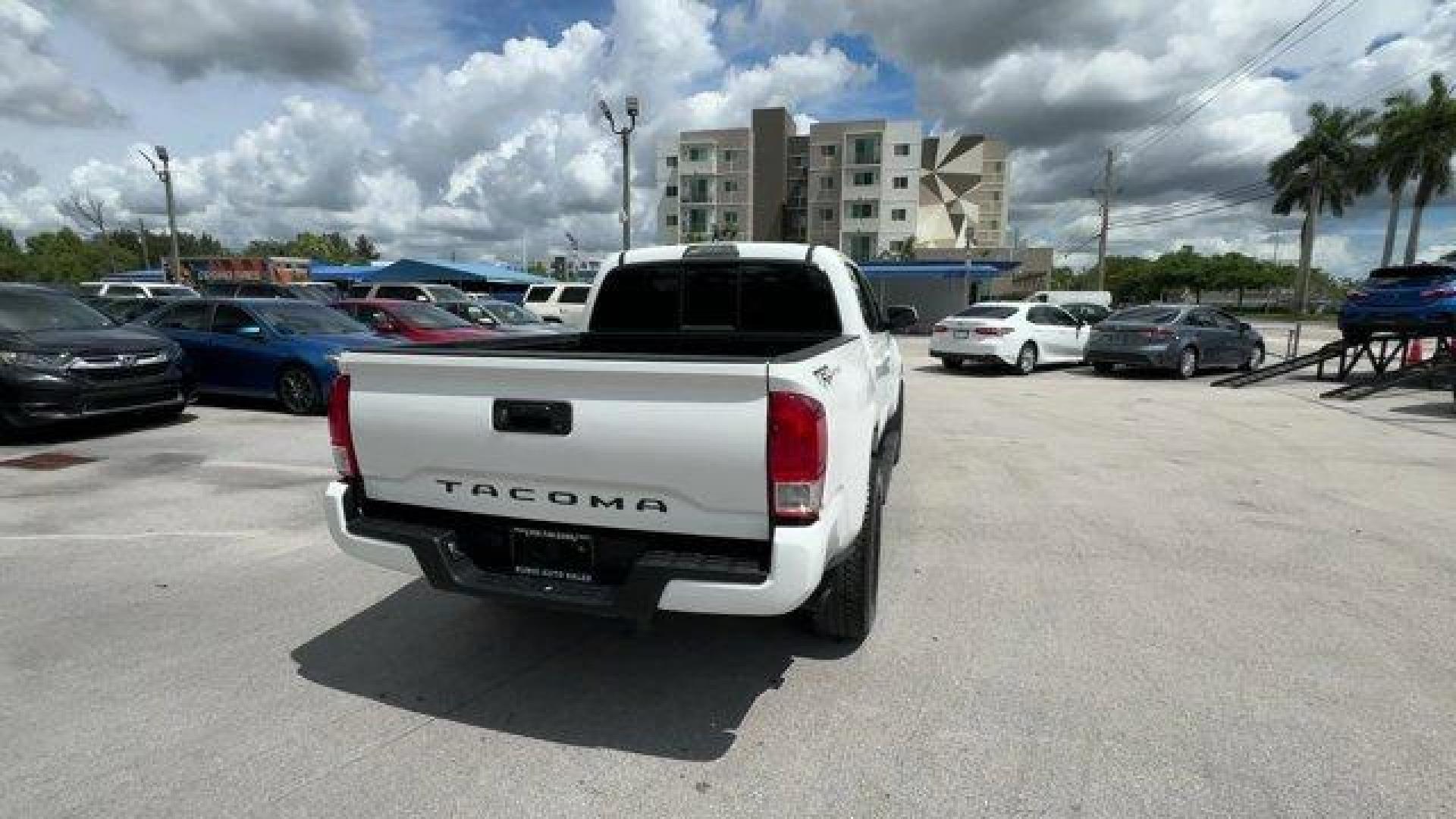 2016 White Toyota Tacoma (5TFAX5GN4GX) with an 4 2.7 L engine, Automatic transmission, located at 27610 S Dixie Hwy, Homestead, FL, 33032, (305) 749-2348, 25.510241, -80.438301 - KBB.com Best Resale Value Awards. Delivers 23 Highway MPG and 19 City MPG! This Toyota Tacoma boasts a Regular Unleaded I-4 2.7 L/164 engine powering this Automatic transmission. Wheels: 16 x 7J+30 Style Steel Disc, Urethane Gear Shifter Material, Transmission: 6-Speed Automatic -inc: electronic shi - Photo#4