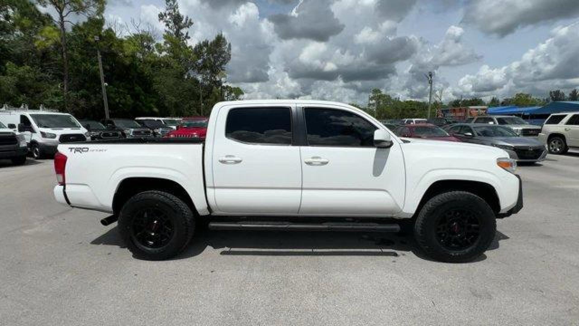 2016 White Toyota Tacoma (5TFAX5GN4GX) with an 4 2.7 L engine, Automatic transmission, located at 27610 S Dixie Hwy, Homestead, FL, 33032, (305) 749-2348, 25.510241, -80.438301 - KBB.com Best Resale Value Awards. Delivers 23 Highway MPG and 19 City MPG! This Toyota Tacoma boasts a Regular Unleaded I-4 2.7 L/164 engine powering this Automatic transmission. Wheels: 16 x 7J+30 Style Steel Disc, Urethane Gear Shifter Material, Transmission: 6-Speed Automatic -inc: electronic shi - Photo#5