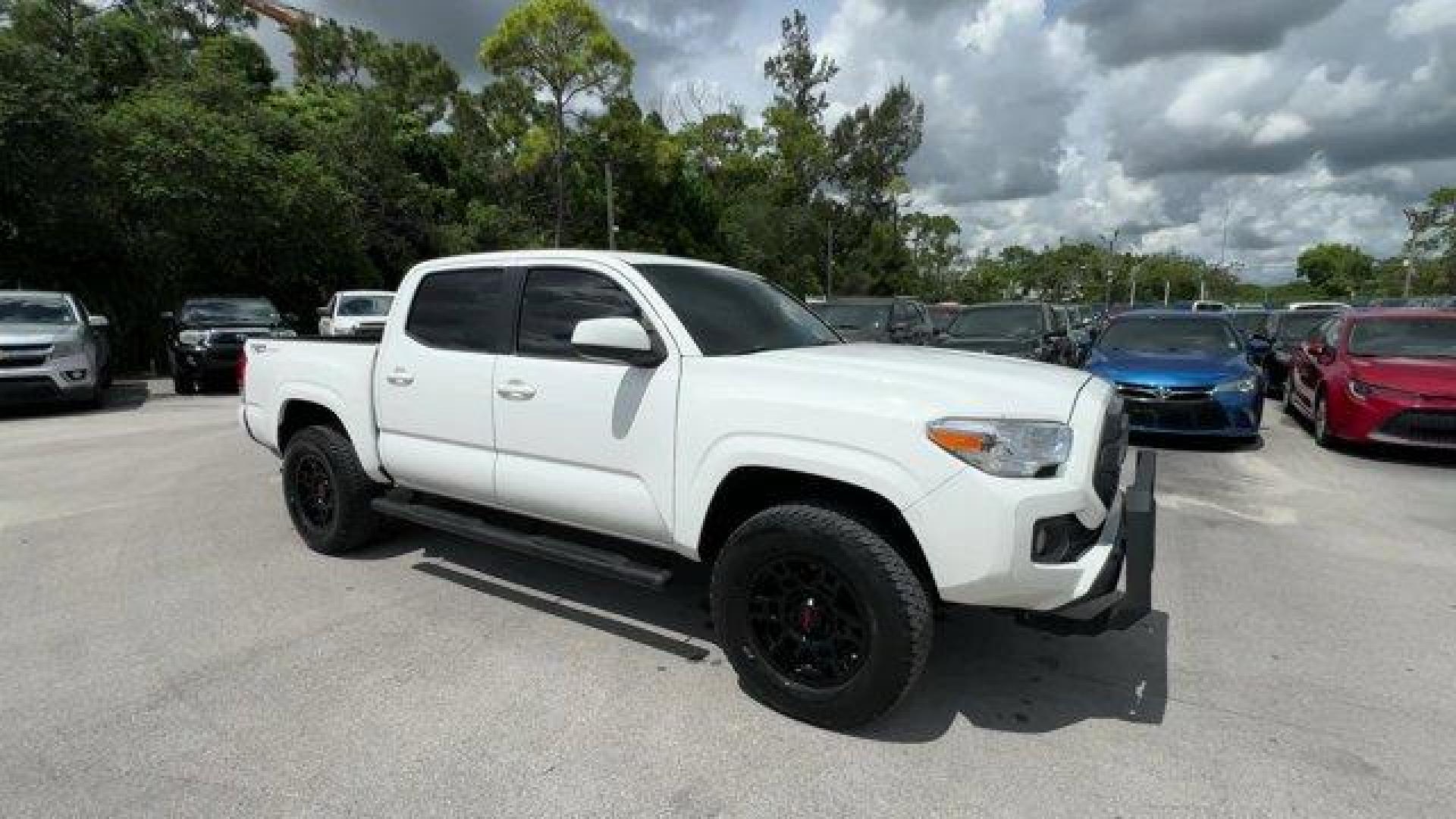 2016 White Toyota Tacoma (5TFAX5GN4GX) with an 4 2.7 L engine, Automatic transmission, located at 27610 S Dixie Hwy, Homestead, FL, 33032, (305) 749-2348, 25.510241, -80.438301 - KBB.com Best Resale Value Awards. Delivers 23 Highway MPG and 19 City MPG! This Toyota Tacoma boasts a Regular Unleaded I-4 2.7 L/164 engine powering this Automatic transmission. Wheels: 16 x 7J+30 Style Steel Disc, Urethane Gear Shifter Material, Transmission: 6-Speed Automatic -inc: electronic shi - Photo#6