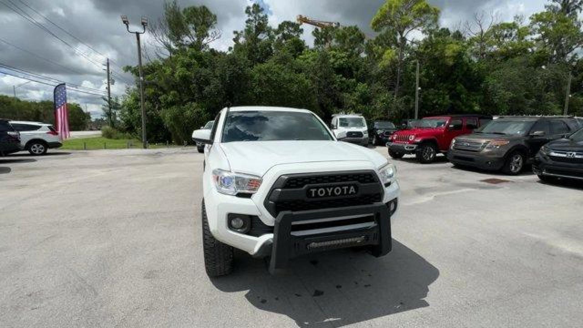 2016 White Toyota Tacoma (5TFAX5GN4GX) with an 4 2.7 L engine, Automatic transmission, located at 27610 S Dixie Hwy, Homestead, FL, 33032, (305) 749-2348, 25.510241, -80.438301 - KBB.com Best Resale Value Awards. Delivers 23 Highway MPG and 19 City MPG! This Toyota Tacoma boasts a Regular Unleaded I-4 2.7 L/164 engine powering this Automatic transmission. Wheels: 16 x 7J+30 Style Steel Disc, Urethane Gear Shifter Material, Transmission: 6-Speed Automatic -inc: electronic shi - Photo#7