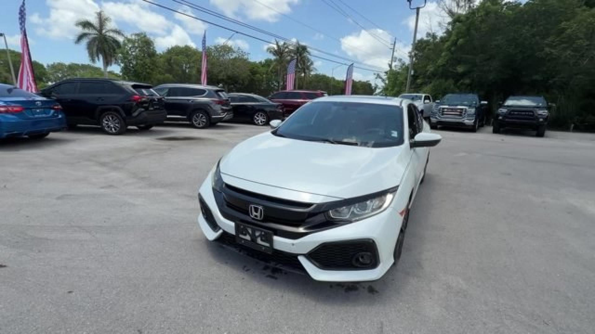 2018 White Honda Civic Hatchback (SHHFK7H51JU) with an 4 1.5 L engine, Variable transmission, located at 27610 S Dixie Hwy, Homestead, FL, 33032, (305) 749-2348, 25.510241, -80.438301 - KBB.com 10 Most Awarded Brands. Boasts 40 Highway MPG and 31 City MPG! This Honda Civic Hatchback boasts a Intercooled Turbo Regular Unleaded I-4 1.5 L/91 engine powering this Variable transmission. Wheels: 17 Alloy, Wheels w/Silver Accents, VSA Electronic Stability Control (ESC).*This Honda Civic H- Photo#0