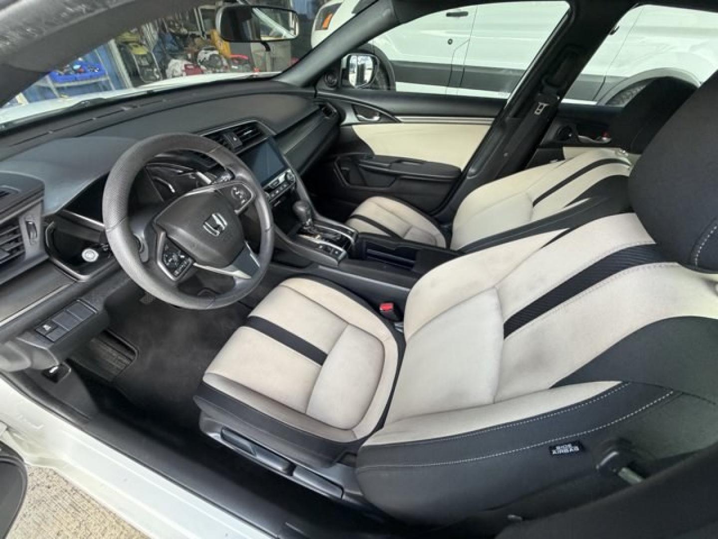 2018 White Honda Civic Hatchback (SHHFK7H51JU) with an 4 1.5 L engine, Variable transmission, located at 27610 S Dixie Hwy, Homestead, FL, 33032, (305) 749-2348, 25.510241, -80.438301 - KBB.com 10 Most Awarded Brands. Boasts 40 Highway MPG and 31 City MPG! This Honda Civic Hatchback boasts a Intercooled Turbo Regular Unleaded I-4 1.5 L/91 engine powering this Variable transmission. Wheels: 17 Alloy, Wheels w/Silver Accents, VSA Electronic Stability Control (ESC).*This Honda Civic H- Photo#10