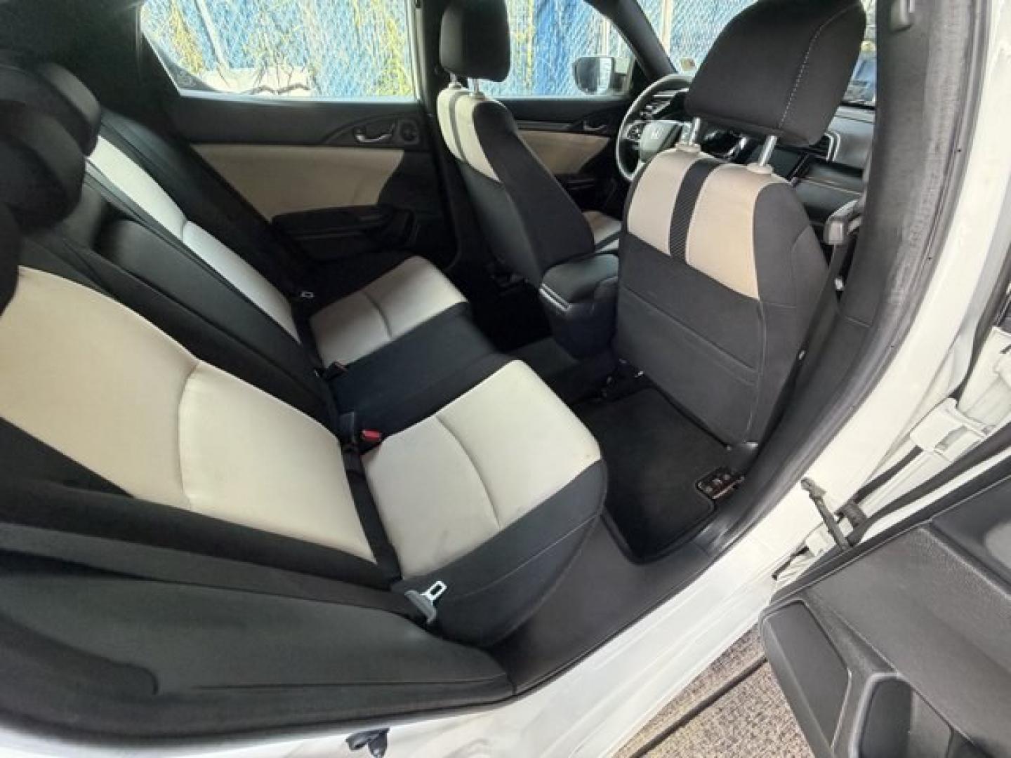 2018 White Honda Civic Hatchback (SHHFK7H51JU) with an 4 1.5 L engine, Variable transmission, located at 27610 S Dixie Hwy, Homestead, FL, 33032, (305) 749-2348, 25.510241, -80.438301 - KBB.com 10 Most Awarded Brands. Boasts 40 Highway MPG and 31 City MPG! This Honda Civic Hatchback boasts a Intercooled Turbo Regular Unleaded I-4 1.5 L/91 engine powering this Variable transmission. Wheels: 17 Alloy, Wheels w/Silver Accents, VSA Electronic Stability Control (ESC).*This Honda Civic H- Photo#11