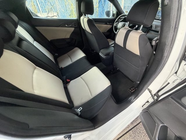 2018 White Honda Civic Hatchback (SHHFK7H51JU) with an 4 1.5 L engine, Variable transmission, located at 27610 S Dixie Hwy, Homestead, FL, 33032, (305) 749-2348, 25.510241, -80.438301 - KBB.com 10 Most Awarded Brands. Boasts 40 Highway MPG and 31 City MPG! This Honda Civic Hatchback boasts a Intercooled Turbo Regular Unleaded I-4 1.5 L/91 engine powering this Variable transmission. Wheels: 17 Alloy, Wheels w/Silver Accents, VSA Electronic Stability Control (ESC).*This Honda Civic H- Photo#11