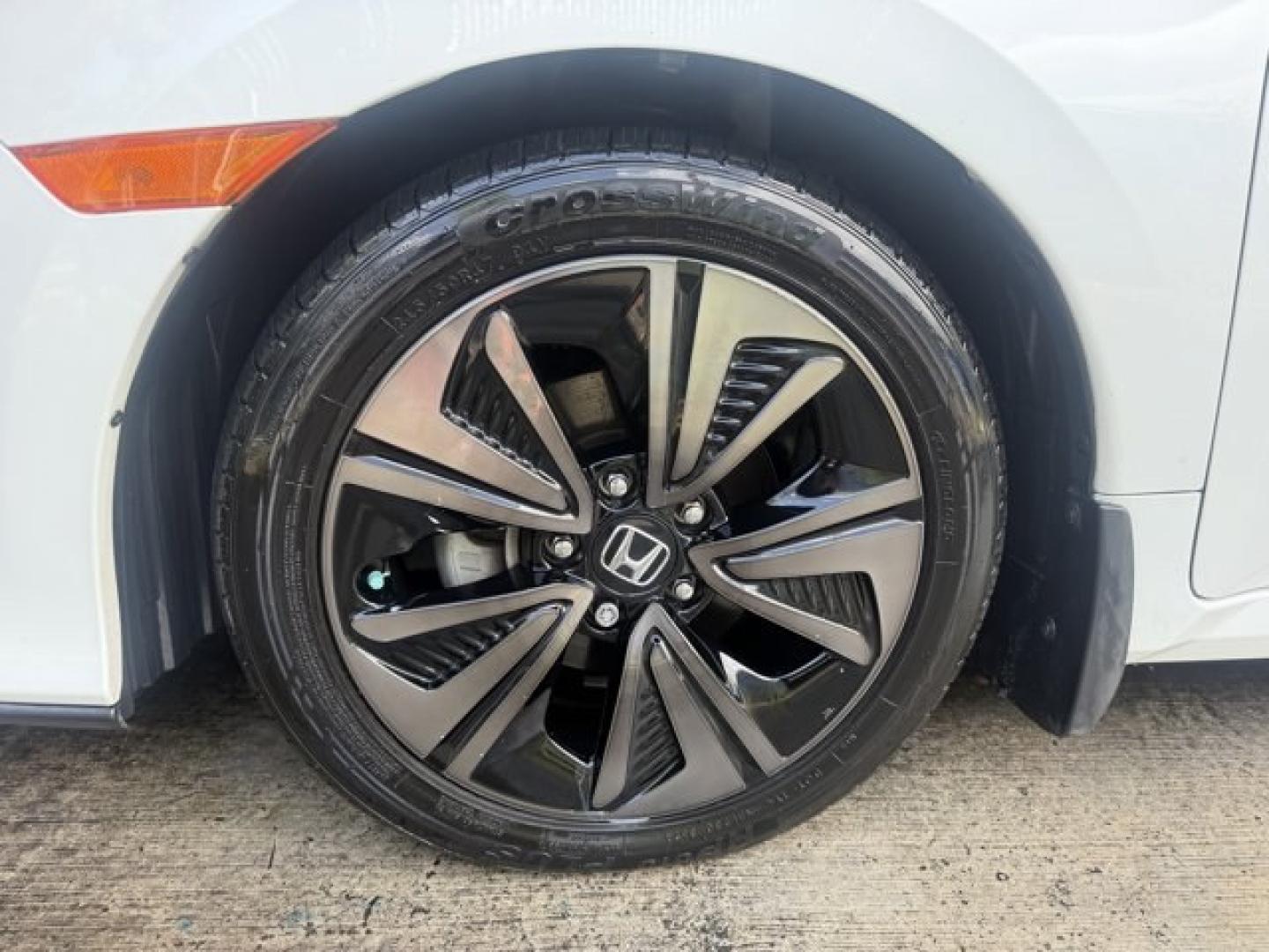 2018 White Honda Civic Hatchback (SHHFK7H51JU) with an 4 1.5 L engine, Variable transmission, located at 27610 S Dixie Hwy, Homestead, FL, 33032, (305) 749-2348, 25.510241, -80.438301 - KBB.com 10 Most Awarded Brands. Boasts 40 Highway MPG and 31 City MPG! This Honda Civic Hatchback boasts a Intercooled Turbo Regular Unleaded I-4 1.5 L/91 engine powering this Variable transmission. Wheels: 17 Alloy, Wheels w/Silver Accents, VSA Electronic Stability Control (ESC).*This Honda Civic H- Photo#14