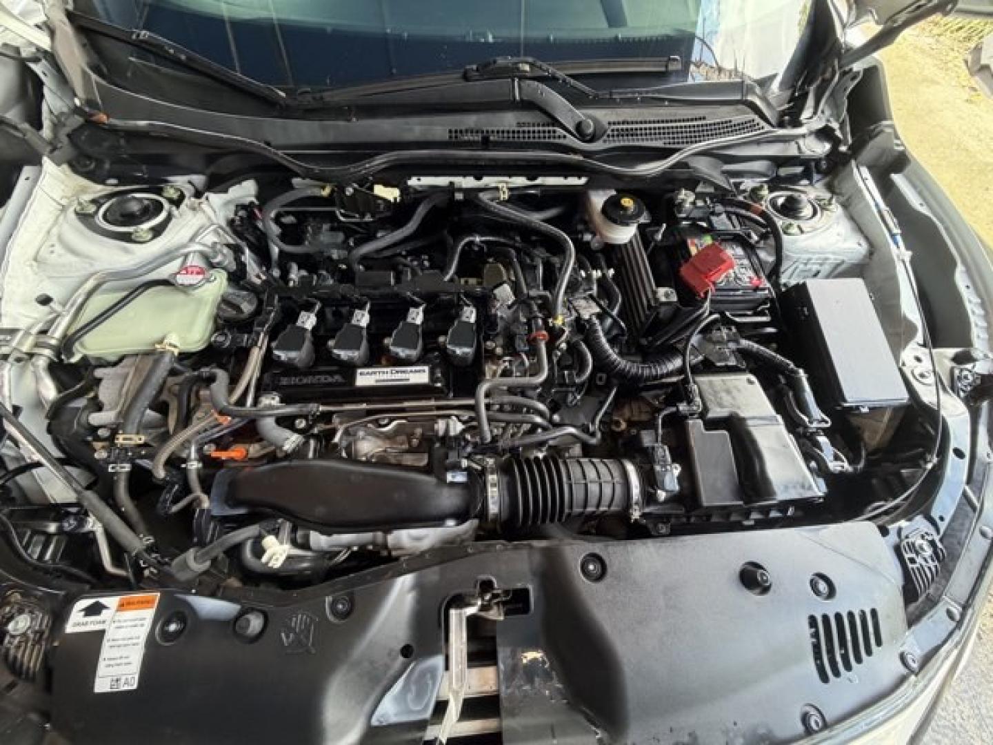 2018 White Honda Civic Hatchback (SHHFK7H51JU) with an 4 1.5 L engine, Variable transmission, located at 27610 S Dixie Hwy, Homestead, FL, 33032, (305) 749-2348, 25.510241, -80.438301 - KBB.com 10 Most Awarded Brands. Boasts 40 Highway MPG and 31 City MPG! This Honda Civic Hatchback boasts a Intercooled Turbo Regular Unleaded I-4 1.5 L/91 engine powering this Variable transmission. Wheels: 17 Alloy, Wheels w/Silver Accents, VSA Electronic Stability Control (ESC).*This Honda Civic H- Photo#15