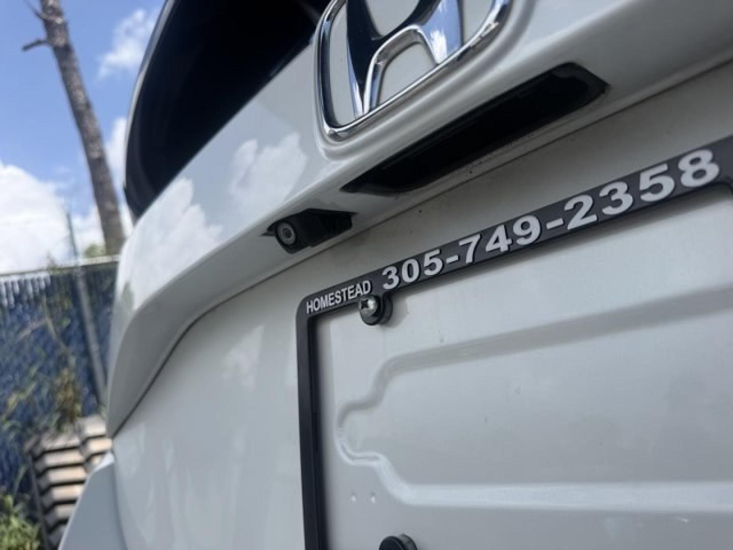 2018 White Honda Civic Hatchback (SHHFK7H51JU) with an 4 1.5 L engine, Variable transmission, located at 27610 S Dixie Hwy, Homestead, FL, 33032, (305) 749-2348, 25.510241, -80.438301 - KBB.com 10 Most Awarded Brands. Boasts 40 Highway MPG and 31 City MPG! This Honda Civic Hatchback boasts a Intercooled Turbo Regular Unleaded I-4 1.5 L/91 engine powering this Variable transmission. Wheels: 17 Alloy, Wheels w/Silver Accents, VSA Electronic Stability Control (ESC).*This Honda Civic H- Photo#16
