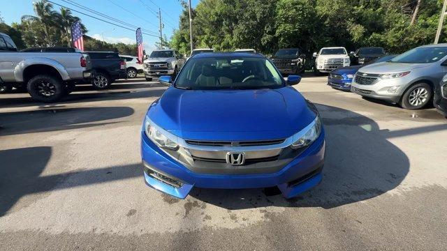 2017 Blue Honda Civic Sedan (19XFC2F52HE) with an 4 2.0 L engine, Variable transmission, located at 27610 S Dixie Hwy, Homestead, FL, 33032, (305) 749-2348, 25.510241, -80.438301 - IIHS Top Safety Pick. Only 95,993 Miles! Boasts 40 Highway MPG and 31 City MPG! This Honda Civic Sedan delivers a Regular Unleaded I-4 2.0 L/122 engine powering this Variable transmission. Wheels: 16 w/Full Covers, VSA Electronic Stability Control (ESC), Valet Function.* This Honda Civic Sedan Featu - Photo#7