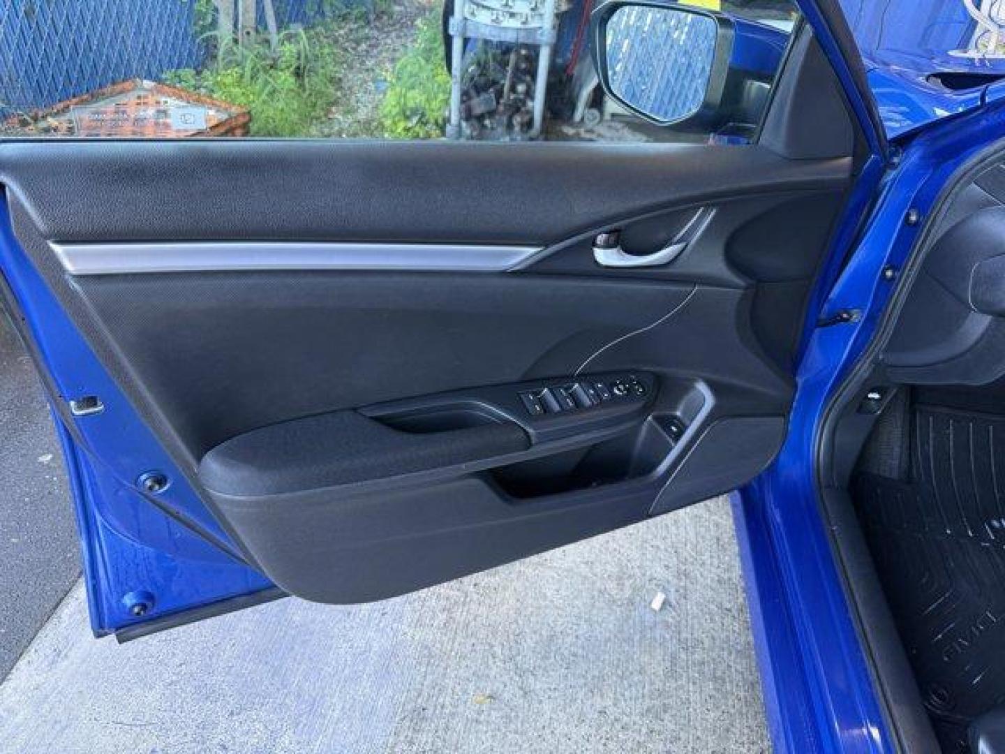 2017 Blue Honda Civic Sedan (19XFC2F52HE) with an 4 2.0 L engine, Variable transmission, located at 27610 S Dixie Hwy, Homestead, FL, 33032, (305) 749-2348, 25.510241, -80.438301 - IIHS Top Safety Pick. Only 95,993 Miles! Boasts 40 Highway MPG and 31 City MPG! This Honda Civic Sedan delivers a Regular Unleaded I-4 2.0 L/122 engine powering this Variable transmission. Wheels: 16 w/Full Covers, VSA Electronic Stability Control (ESC), Valet Function.* This Honda Civic Sedan Featu - Photo#14