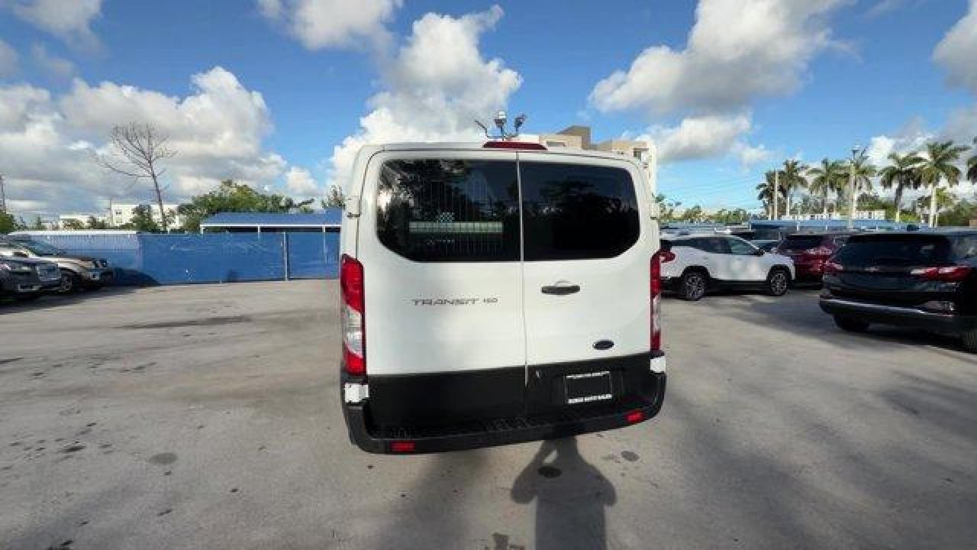 2020 White Ford Transit Cargo Van (1FTYE1YG0LK) with an 6 3.5 L engine, Automatic transmission, located at 27610 S Dixie Hwy, Homestead, FL, 33032, (305) 749-2348, 25.510241, -80.438301 - This Ford Transit Cargo Van delivers a Twin Turbo Premium Unleaded V-6 3.5 L/213 engine powering this Automatic transmission. Wheels: 16 Silver Steel w/Black Hubcap, Wheels w/Hub Covers, Vinyl Front Bucket Seats.* This Ford Transit Cargo Van Features the Following Options *Variable Intermittent Wipe - Photo#3
