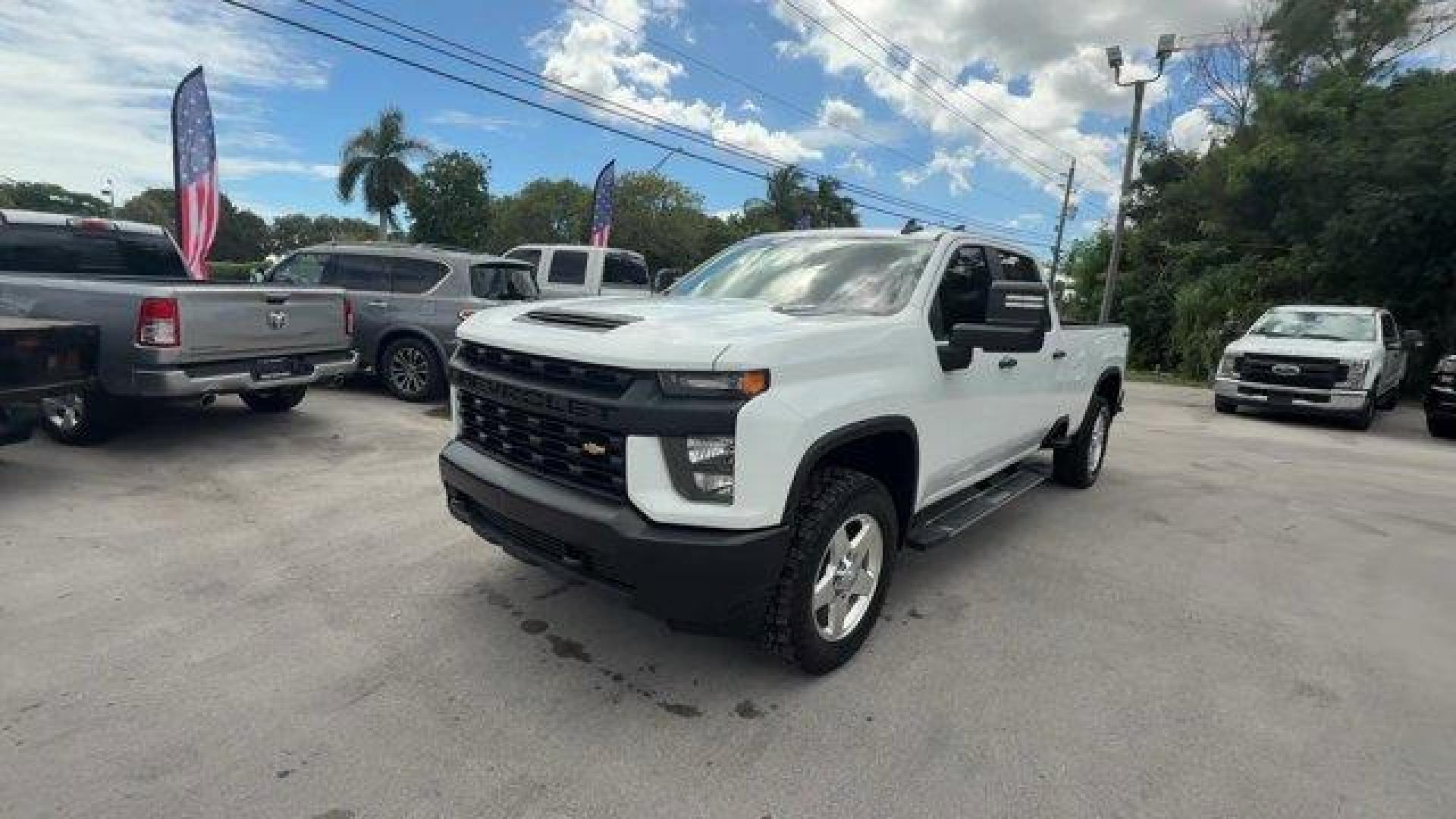 2020 Summit White /Jet Black Chevrolet Silverado 2500HD (1GC1YLEY0LF) with an 8 6.6L engine, Automatic transmission, located at 27610 S Dixie Hwy, Homestead, FL, 33032, (305) 749-2348, 25.510241, -80.438301 - This Chevrolet Silverado 2500HD boasts a Turbocharged Diesel V8 6.6L/403 engine powering this Automatic transmission. WORK TRUCK PREFERRED EQUIPMENT GROUP includes standard equipment, WINTER GRILLE COVER, TRANSMISSION, ALLISON 10-SPEED AUTOMATIC.* This Chevrolet Silverado 2500HD Features the Followi - Photo#0