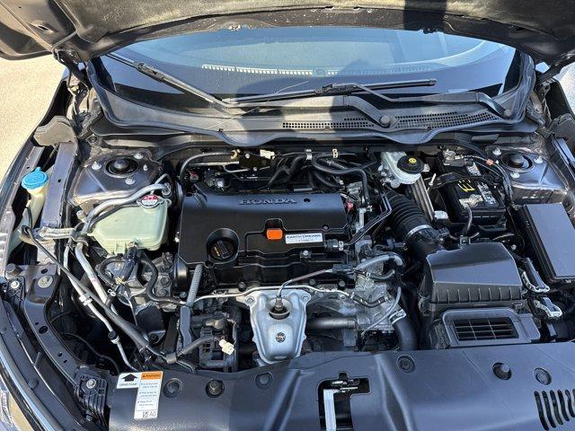 2017 Gray Honda Civic Sedan (19XFC2F56HE) with an 4 2.0 L engine, Variable transmission, located at 27610 S Dixie Hwy, Homestead, FL, 33032, (305) 749-2348, 25.510241, -80.438301 - IIHS Top Safety Pick. Boasts 40 Highway MPG and 31 City MPG! This Honda Civic Sedan delivers a Regular Unleaded I-4 2.0 L/122 engine powering this Variable transmission. Wheels: 16 w/Full Covers, VSA Electronic Stability Control (ESC), Valet Function.*This Honda Civic Sedan Comes Equipped with These - Photo#8