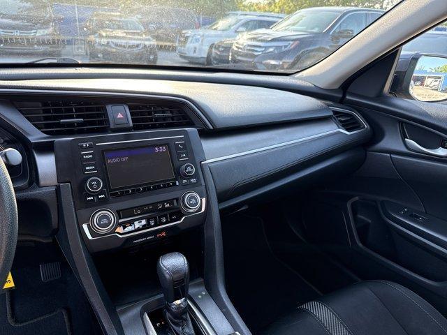 2017 Gray Honda Civic Sedan (19XFC2F56HE) with an 4 2.0 L engine, Variable transmission, located at 27610 S Dixie Hwy, Homestead, FL, 33032, (305) 749-2348, 25.510241, -80.438301 - IIHS Top Safety Pick. Boasts 40 Highway MPG and 31 City MPG! This Honda Civic Sedan delivers a Regular Unleaded I-4 2.0 L/122 engine powering this Variable transmission. Wheels: 16 w/Full Covers, VSA Electronic Stability Control (ESC), Valet Function.*This Honda Civic Sedan Comes Equipped with These - Photo#9