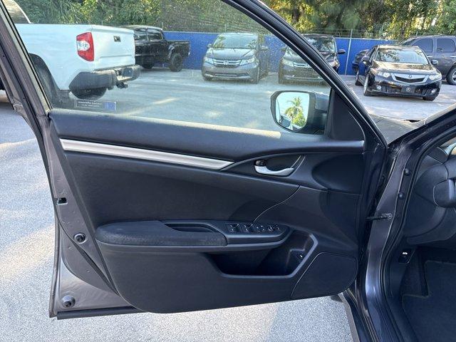 2017 Gray Honda Civic Sedan (19XFC2F56HE) with an 4 2.0 L engine, Variable transmission, located at 27610 S Dixie Hwy, Homestead, FL, 33032, (305) 749-2348, 25.510241, -80.438301 - IIHS Top Safety Pick. Boasts 40 Highway MPG and 31 City MPG! This Honda Civic Sedan delivers a Regular Unleaded I-4 2.0 L/122 engine powering this Variable transmission. Wheels: 16 w/Full Covers, VSA Electronic Stability Control (ESC), Valet Function.*This Honda Civic Sedan Comes Equipped with These - Photo#12