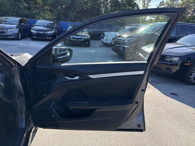 2017 Gray Honda Civic Sedan (19XFC2F56HE) with an 4 2.0 L engine, Variable transmission, located at 27610 S Dixie Hwy, Homestead, FL, 33032, (305) 749-2348, 25.510241, -80.438301 - IIHS Top Safety Pick. Boasts 40 Highway MPG and 31 City MPG! This Honda Civic Sedan delivers a Regular Unleaded I-4 2.0 L/122 engine powering this Variable transmission. Wheels: 16 w/Full Covers, VSA Electronic Stability Control (ESC), Valet Function.*This Honda Civic Sedan Comes Equipped with These - Photo#15