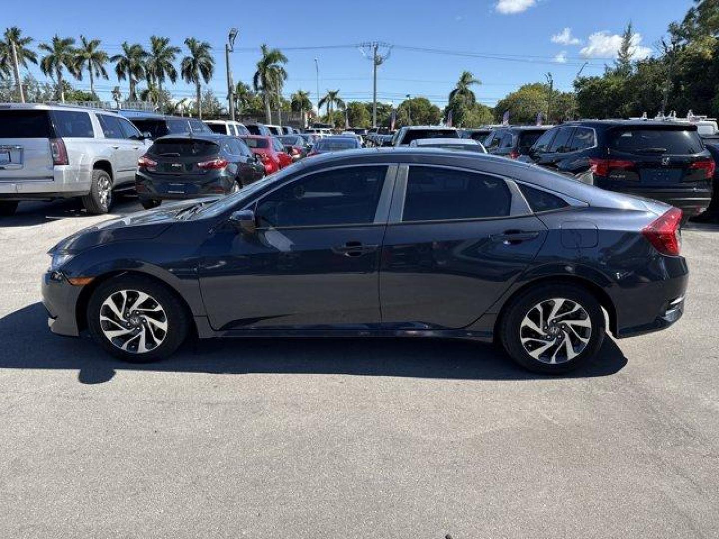 2016 Blue Honda Civic Sedan (19XFC2F70GE) with an 4 2.0 L engine, Variable transmission, located at 27610 S Dixie Hwy, Homestead, FL, 33032, (305) 749-2348, 25.510241, -80.438301 - IIHS Top Safety Pick+. Only 98,630 Miles! Scores 41 Highway MPG and 31 City MPG! This Honda Civic Sedan delivers a Regular Unleaded I-4 2.0 L/122 engine powering this Variable transmission. Window Grid Antenna, Wheels: 16 Alloy, Wheels w/Silver Accents.* This Honda Civic Sedan Features the Following - Photo#1