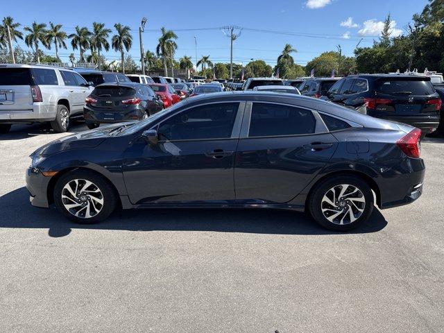 2016 Blue Honda Civic Sedan (19XFC2F70GE) with an 4 2.0 L engine, Variable transmission, located at 27610 S Dixie Hwy, Homestead, FL, 33032, (305) 749-2348, 25.510241, -80.438301 - IIHS Top Safety Pick+. Only 98,630 Miles! Scores 41 Highway MPG and 31 City MPG! This Honda Civic Sedan delivers a Regular Unleaded I-4 2.0 L/122 engine powering this Variable transmission. Window Grid Antenna, Wheels: 16 Alloy, Wheels w/Silver Accents.* This Honda Civic Sedan Features the Following - Photo#1